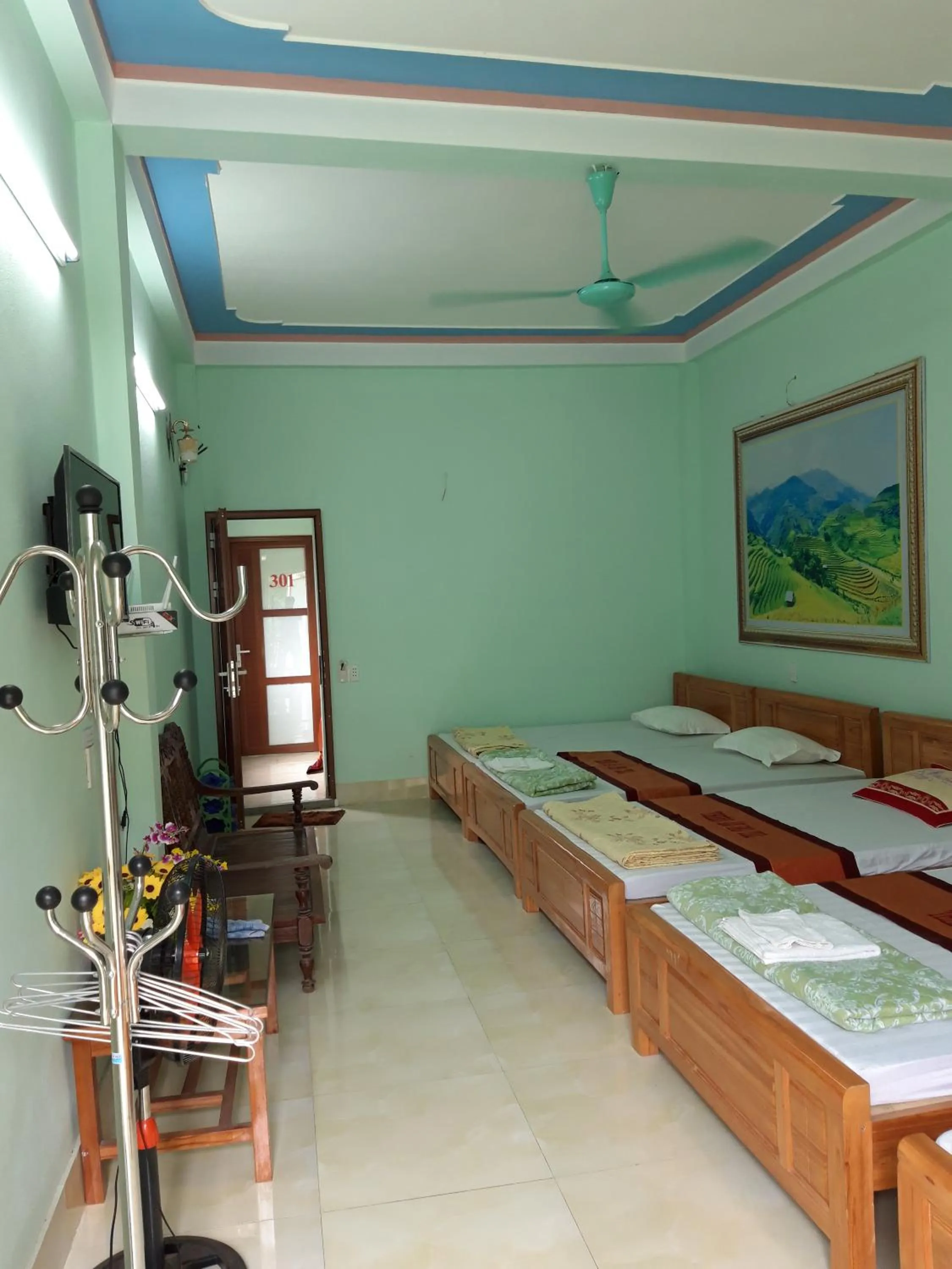 Bed in Yen Minh Hotel Thien An