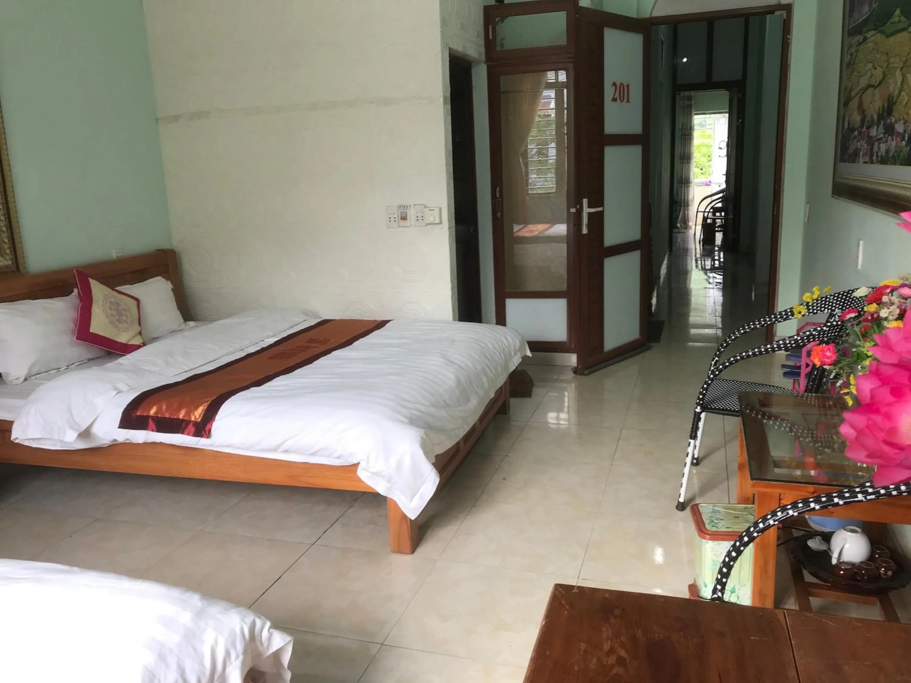 Bed in Yen Minh Hotel Thien An