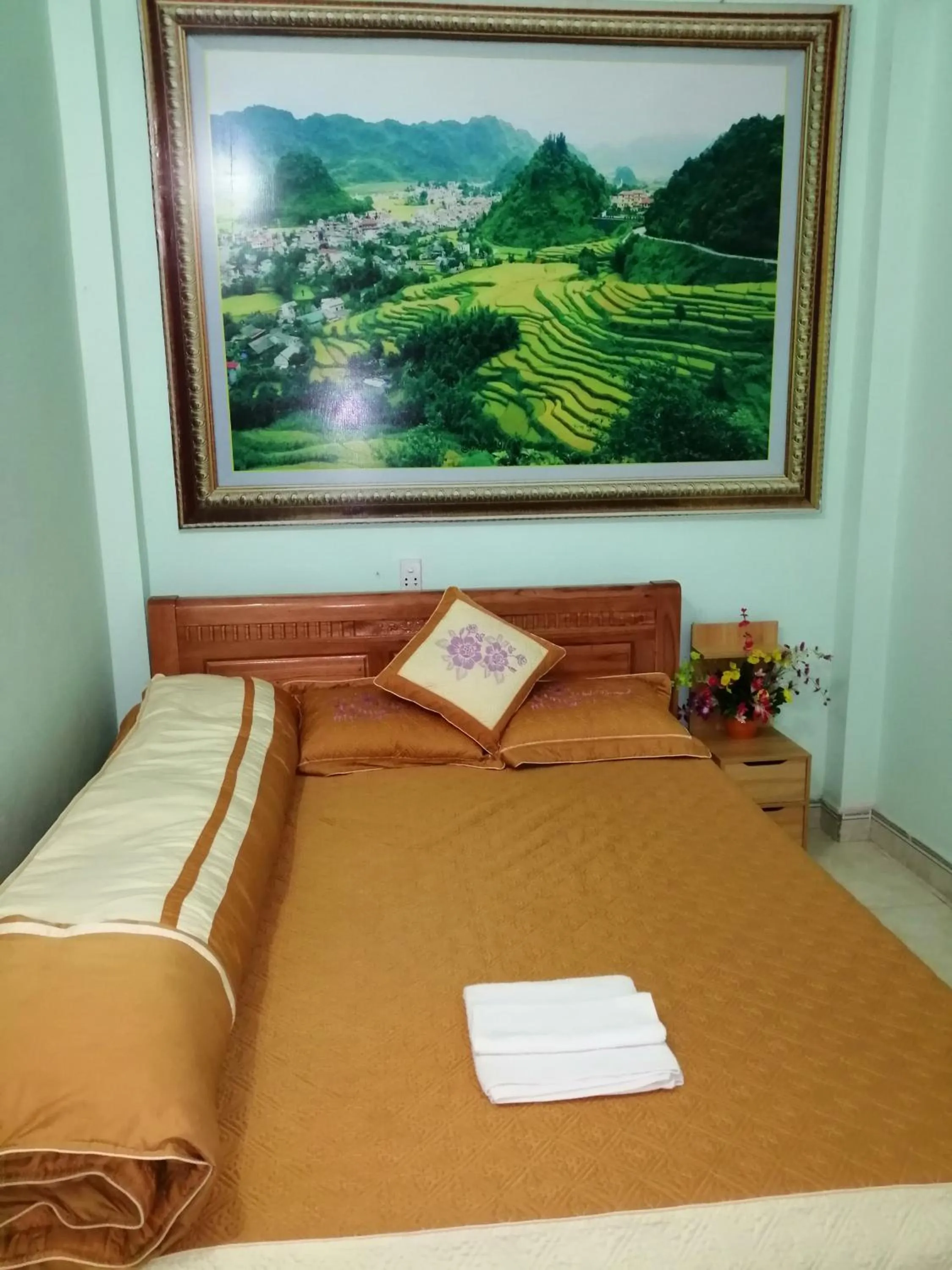 Bed in Yen Minh Hotel Thien An