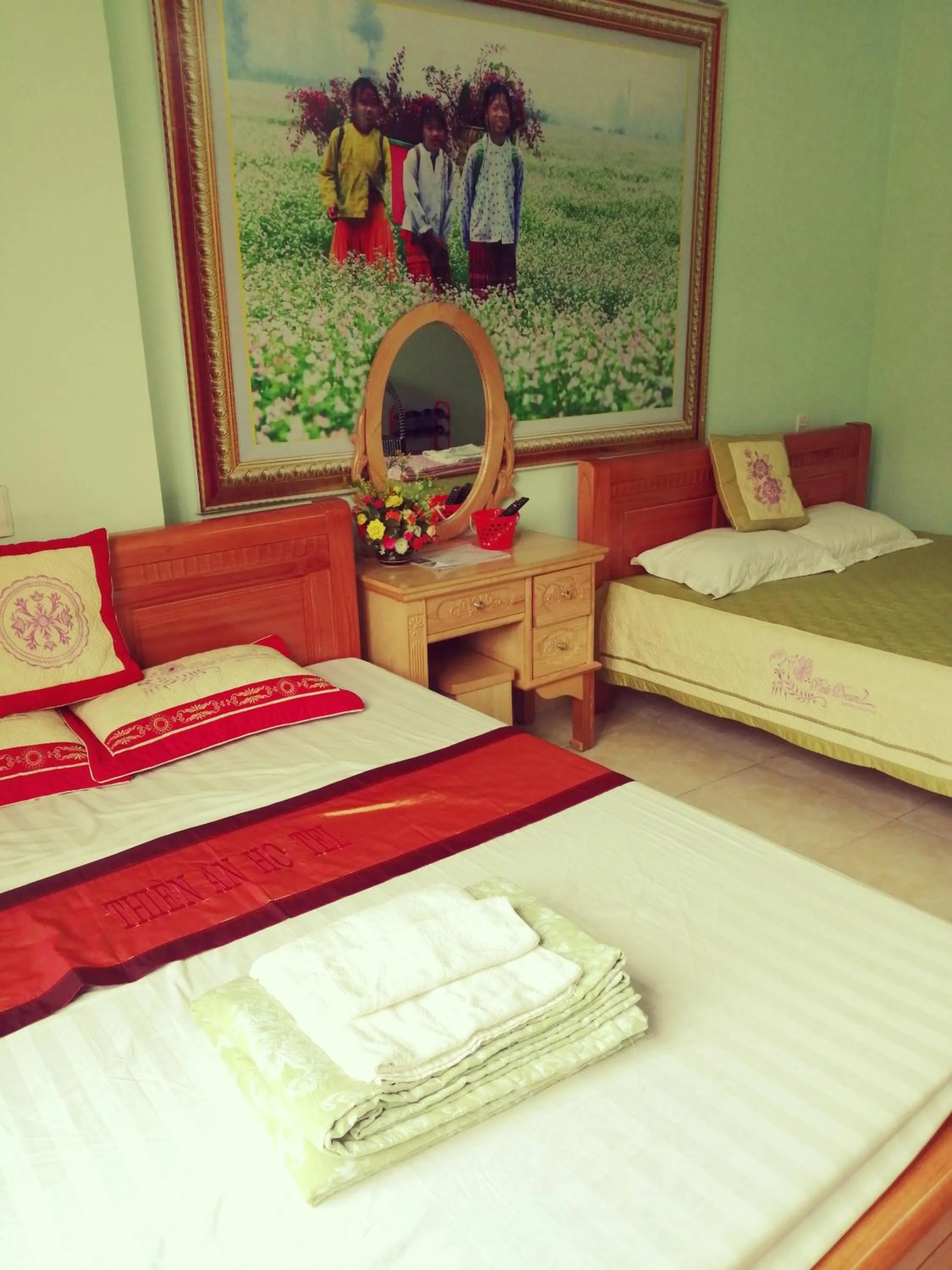 Bed in Yen Minh Hotel Thien An