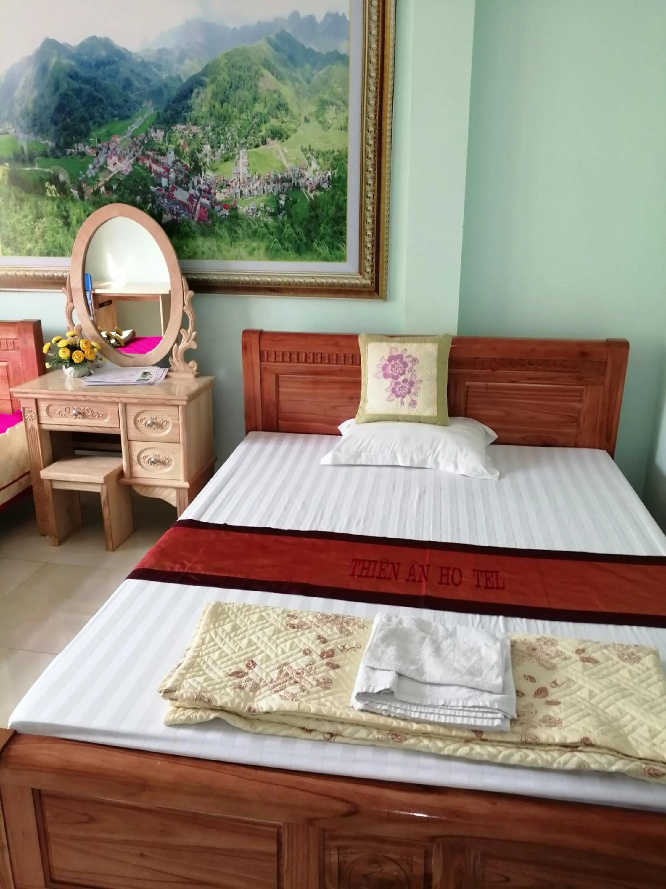 Bed in Yen Minh Hotel Thien An