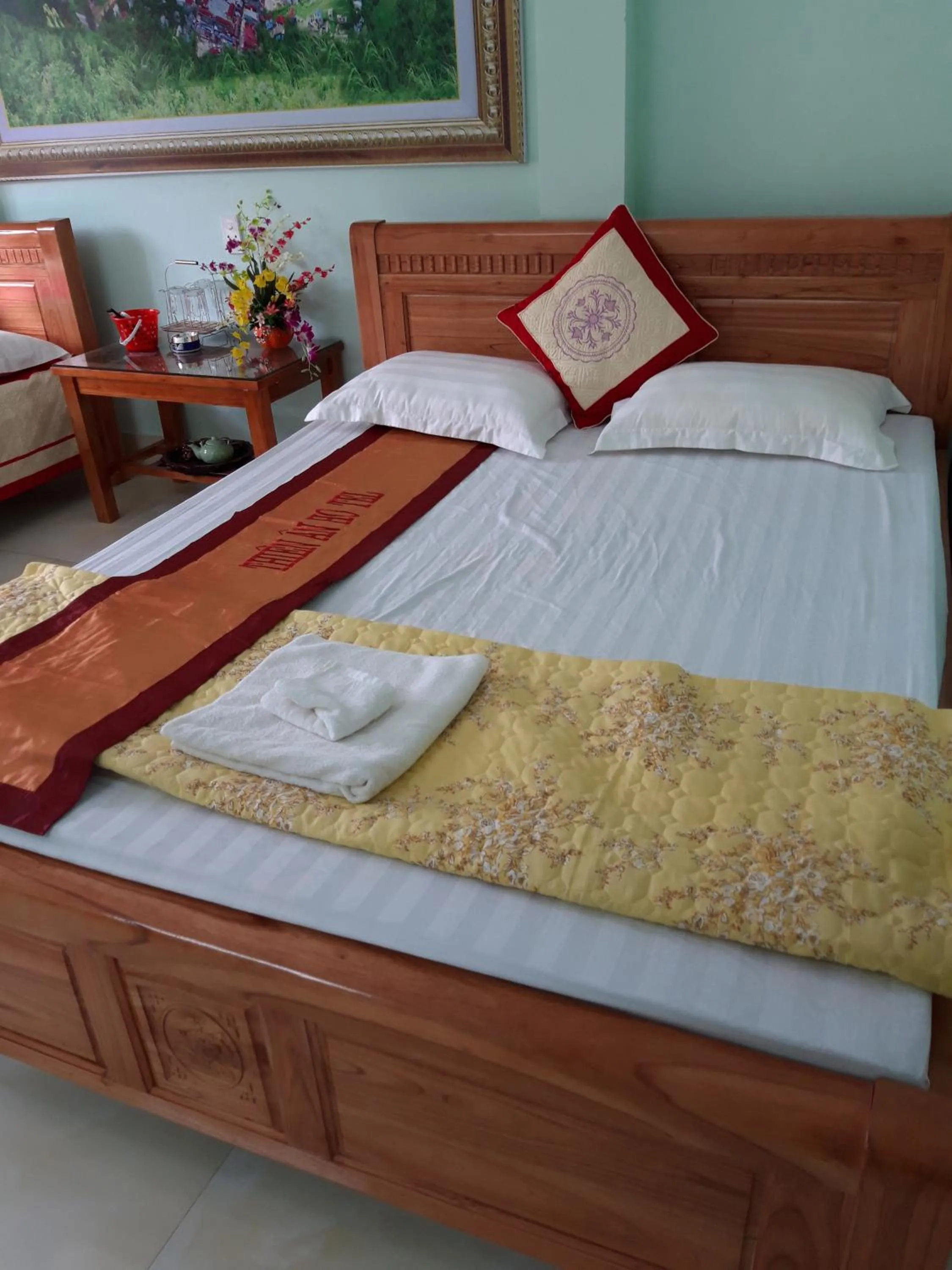 Bed in Yen Minh Hotel Thien An