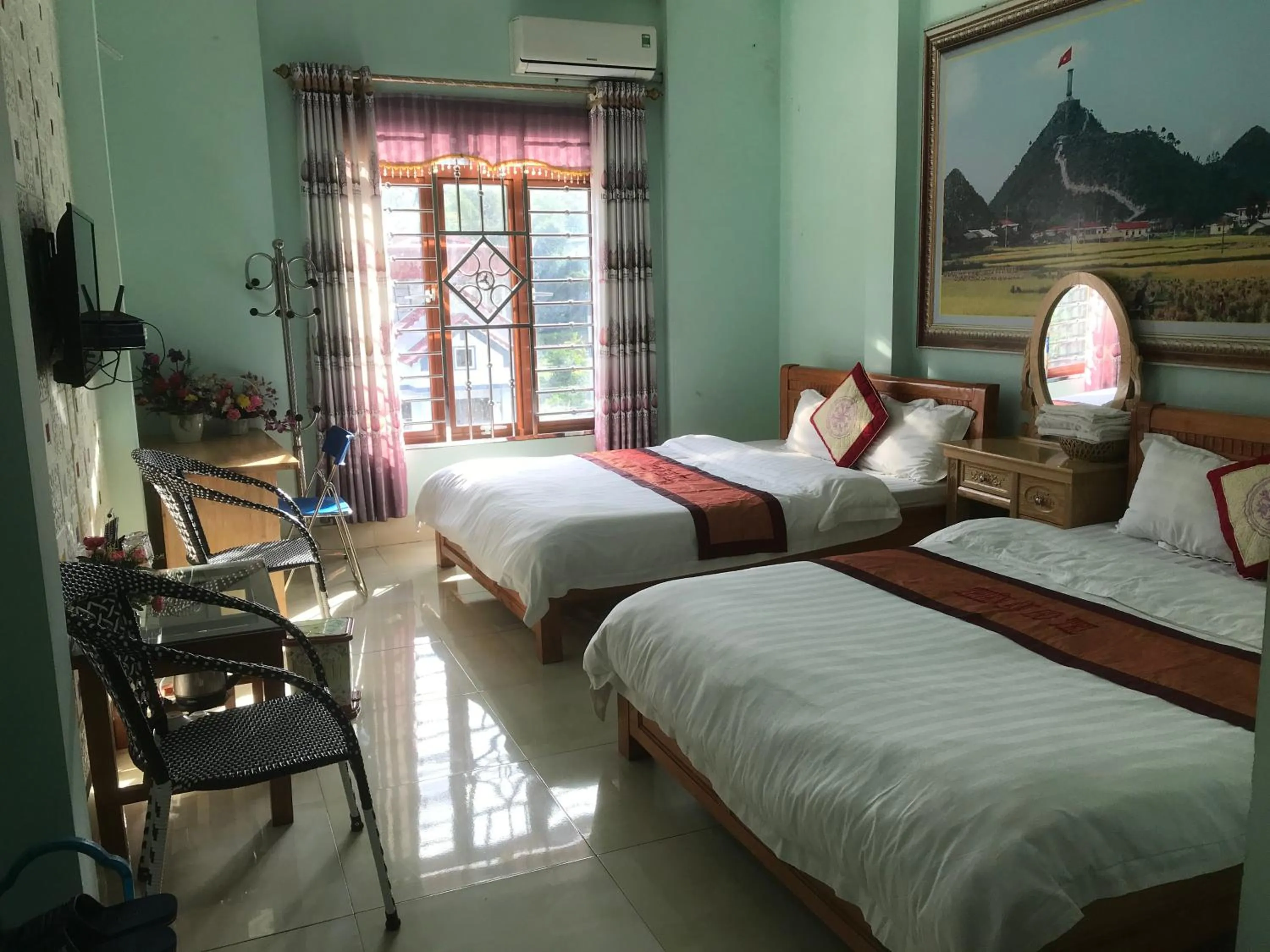 Bed in Yen Minh Hotel Thien An