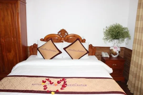 Bed in Yen Minh Hotel Thien An