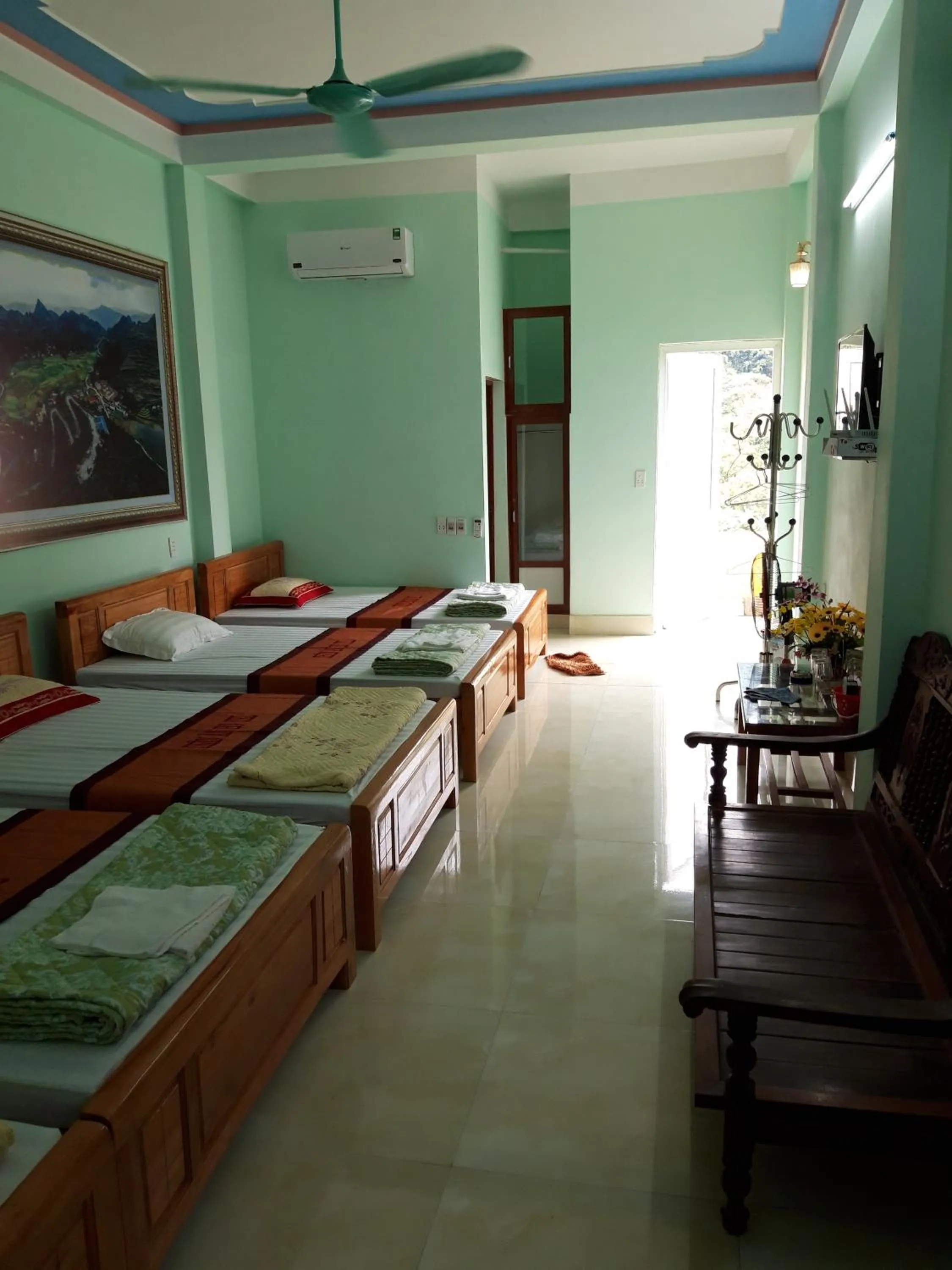 Bed in Yen Minh Hotel Thien An