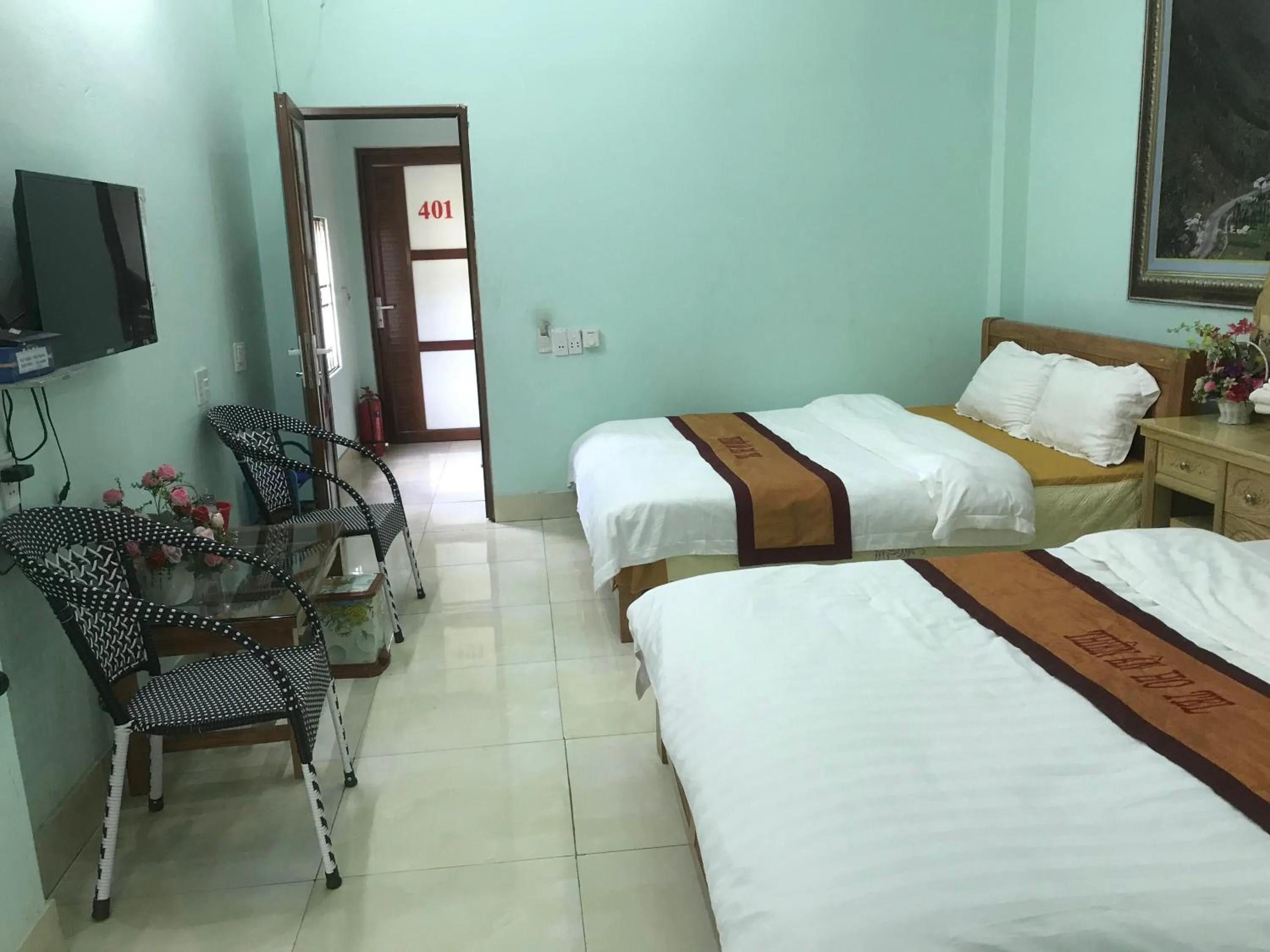 Bed in Yen Minh Hotel Thien An