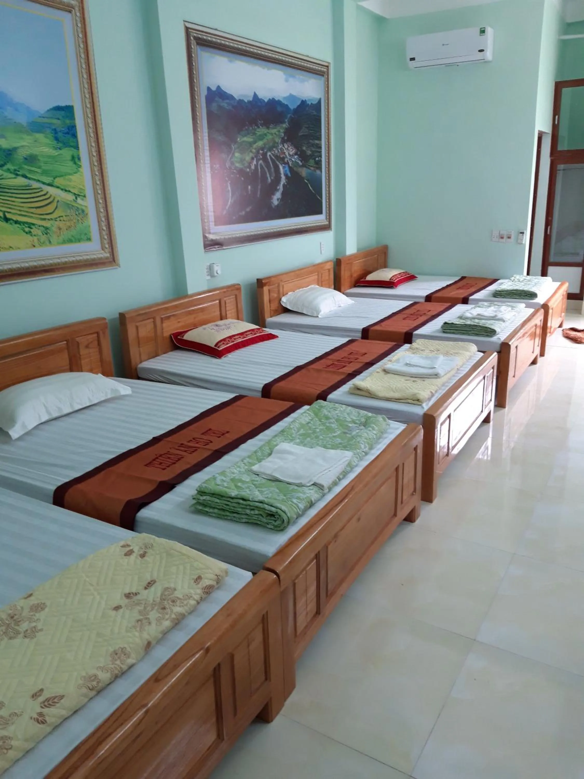 Bed in Yen Minh Hotel Thien An