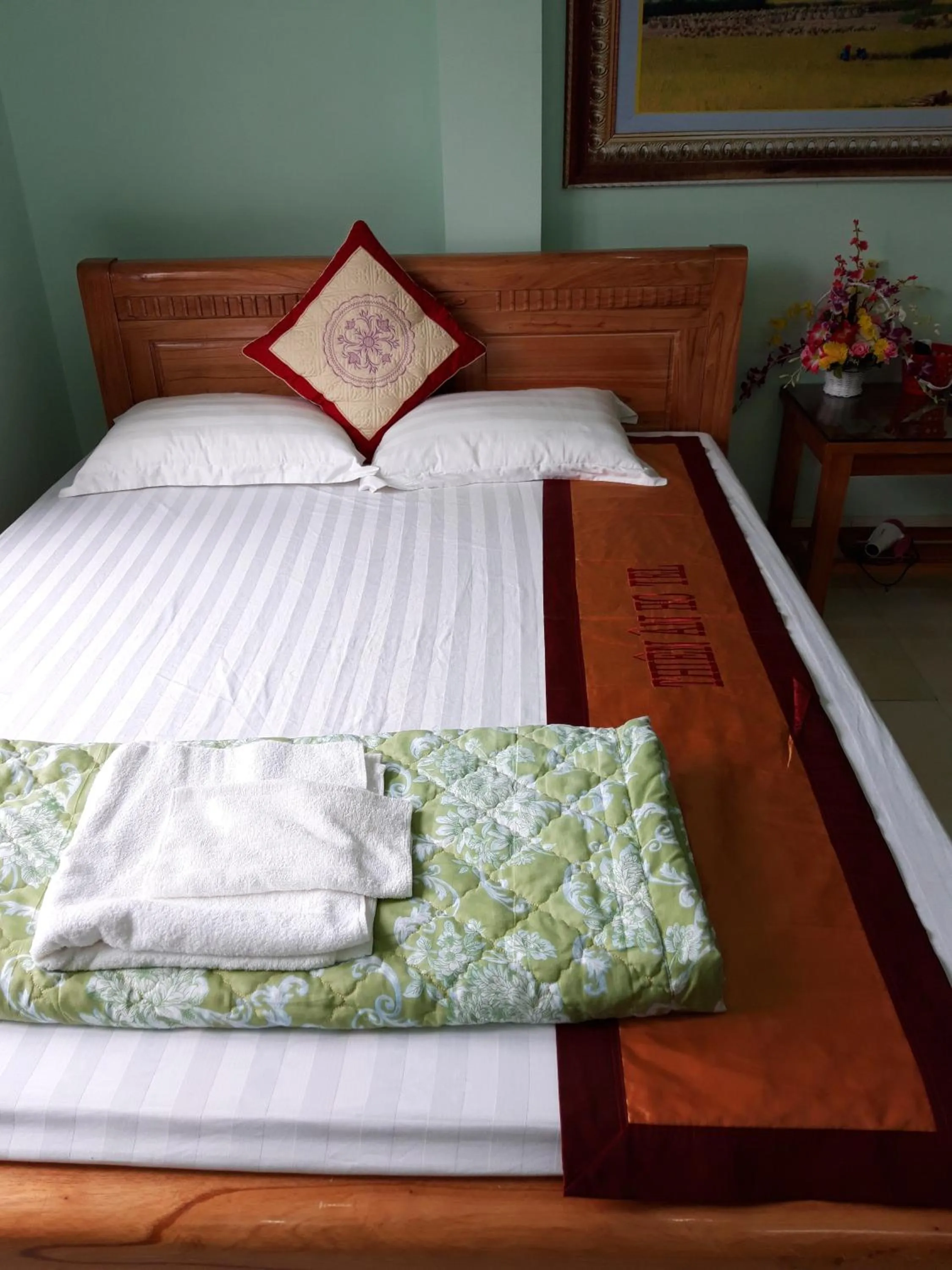 Bed in Yen Minh Hotel Thien An