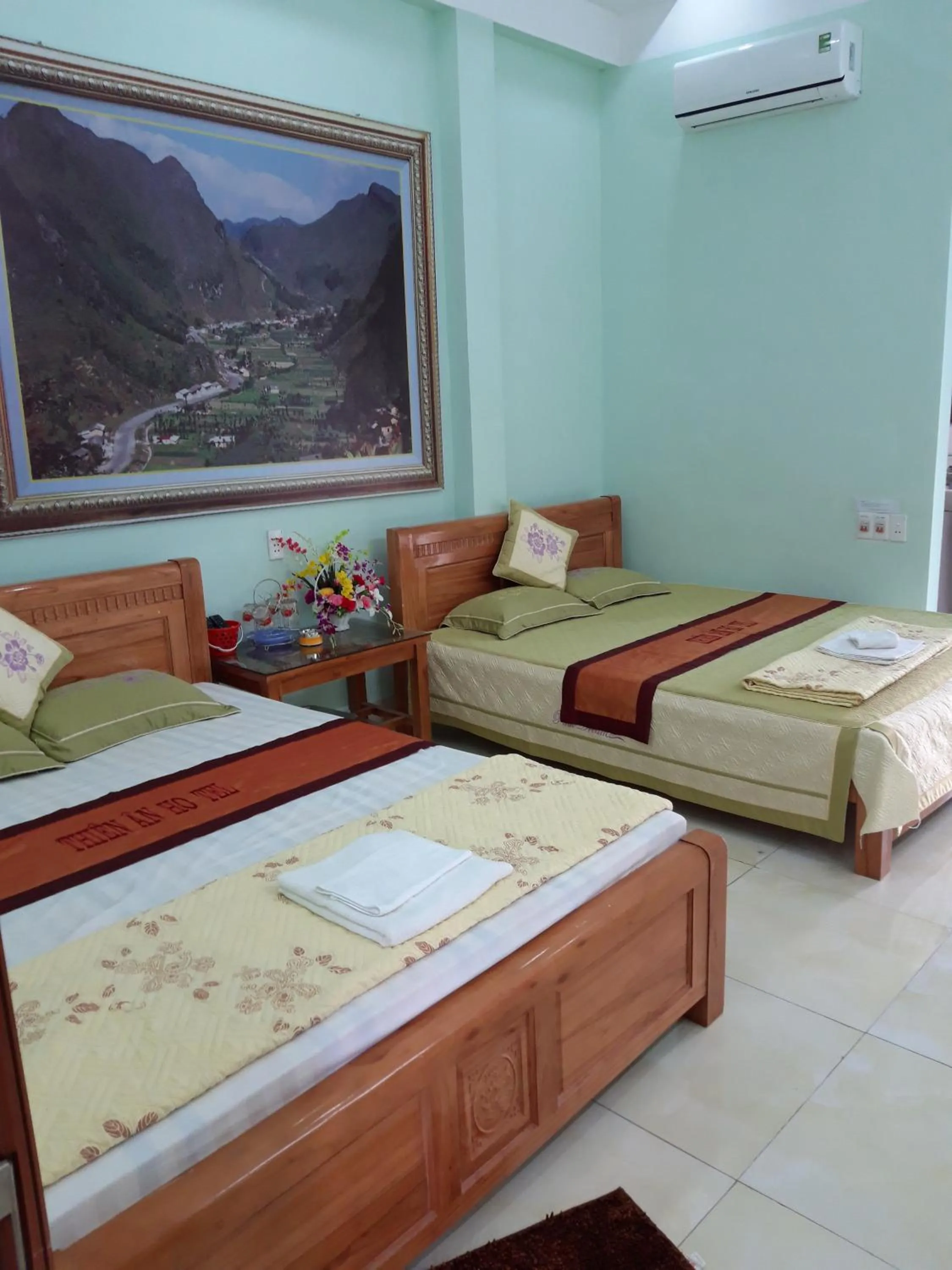 Bed in Yen Minh Hotel Thien An