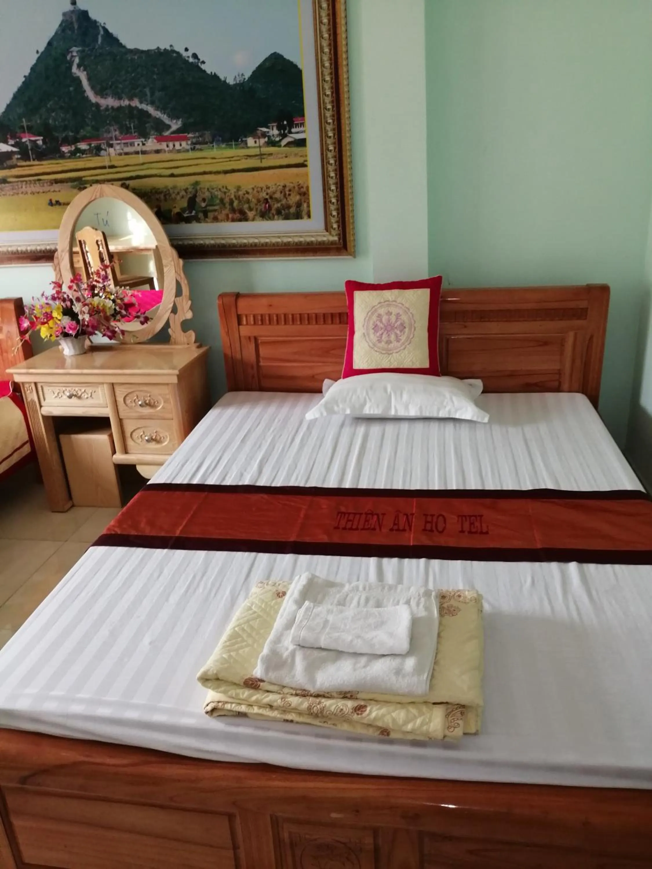 Bed in Yen Minh Hotel Thien An