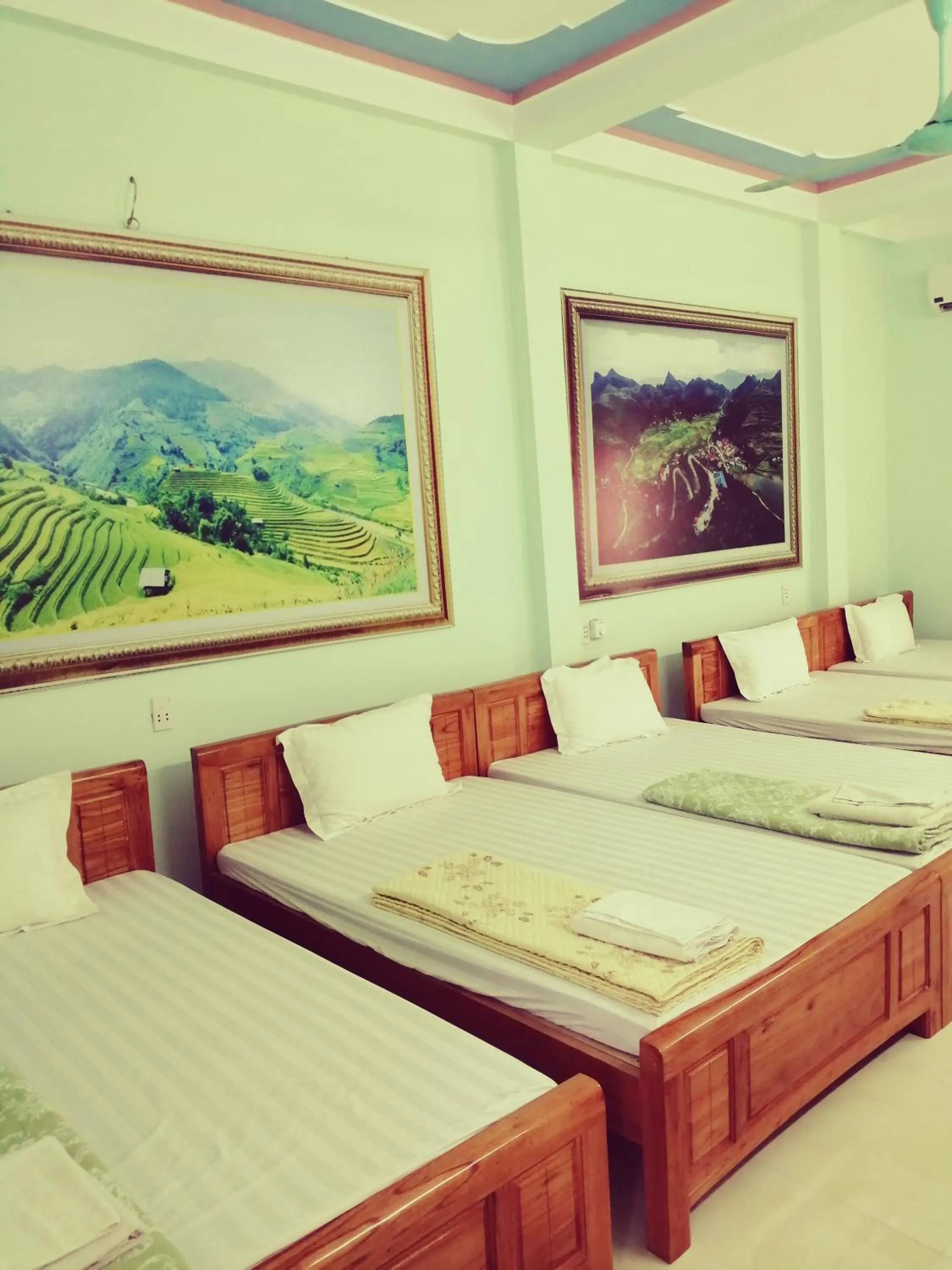 Bed in Yen Minh Hotel Thien An