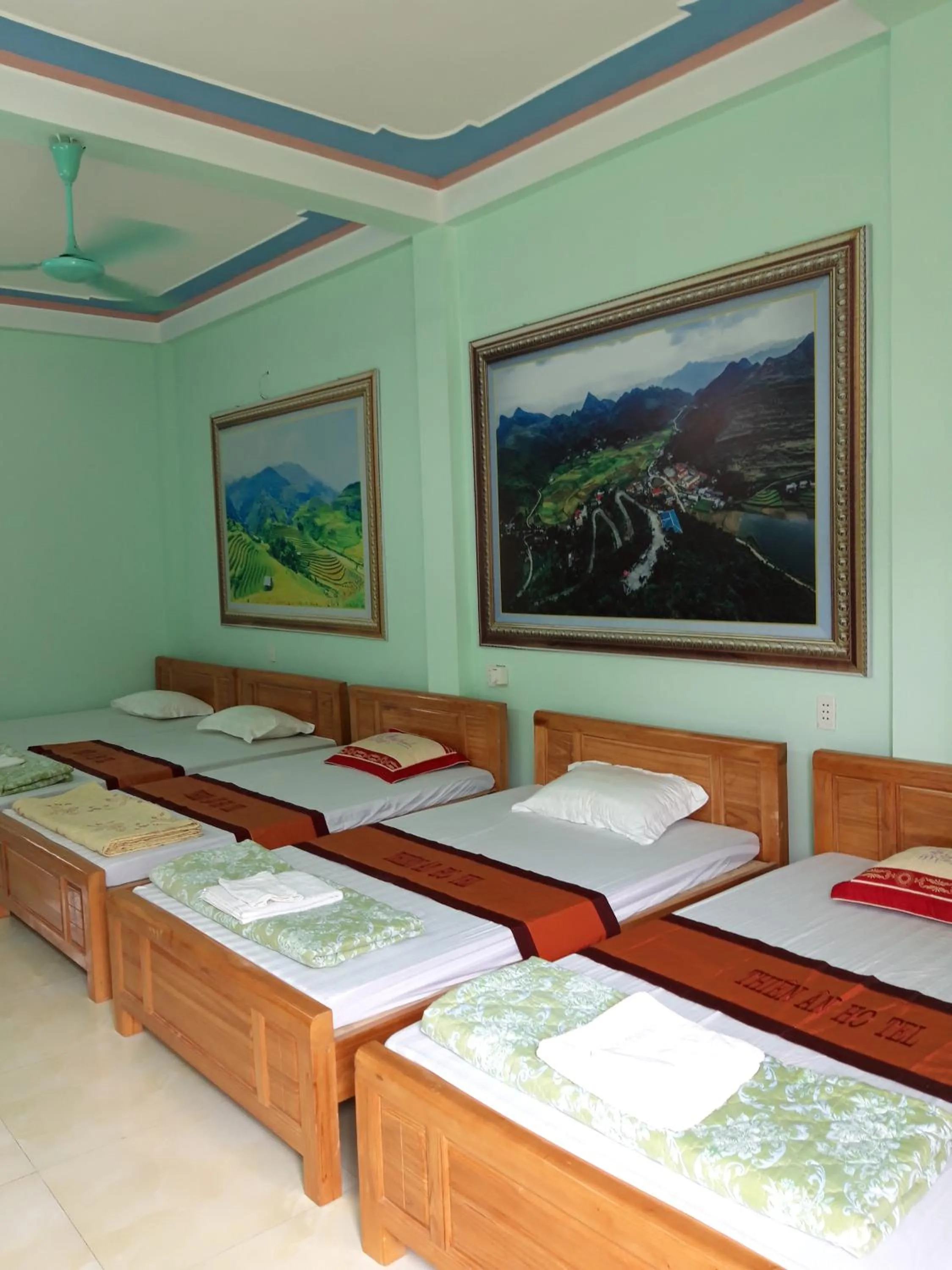 Bed in Yen Minh Hotel Thien An