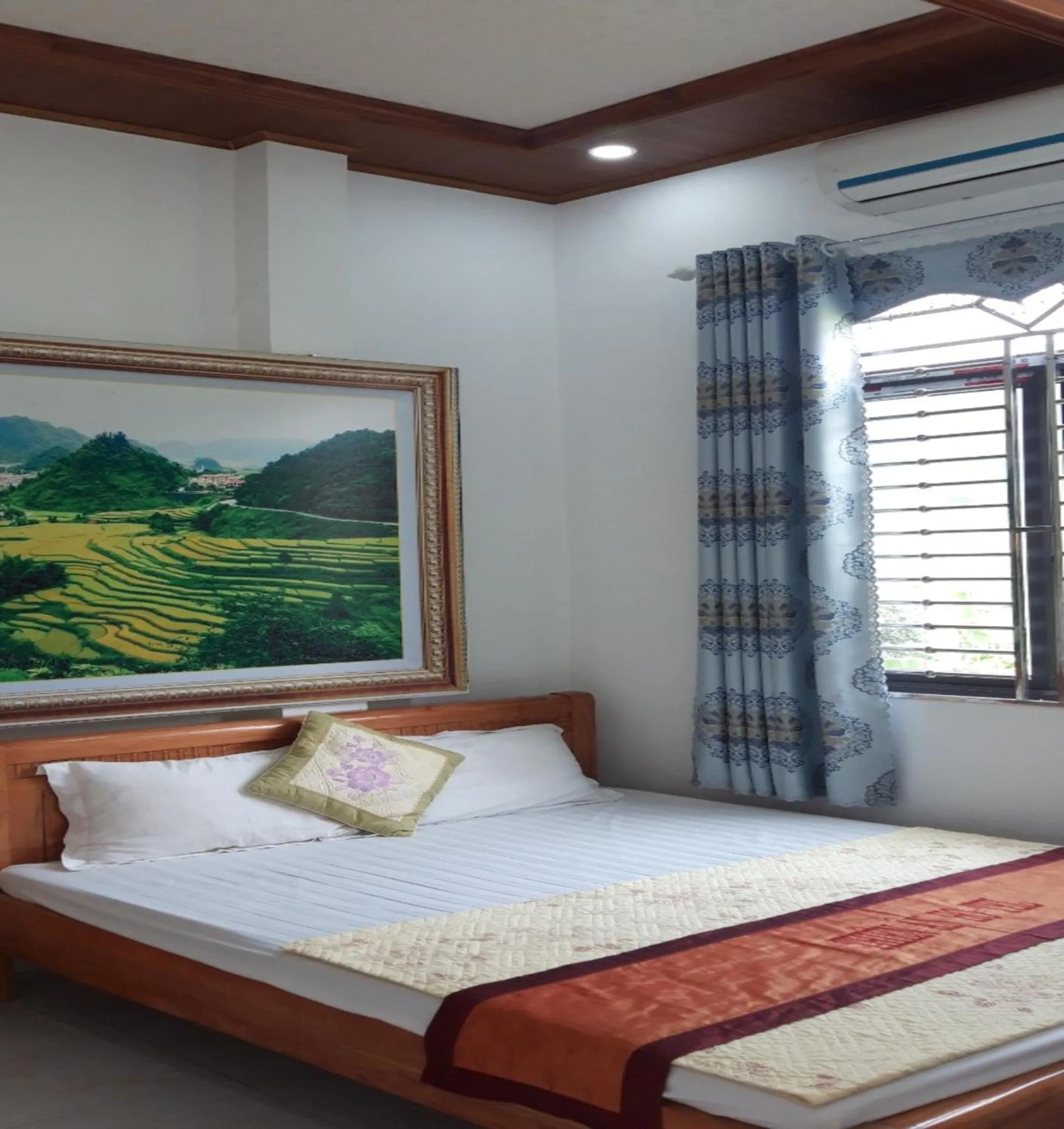 Bed in Yen Minh Hotel Thien An
