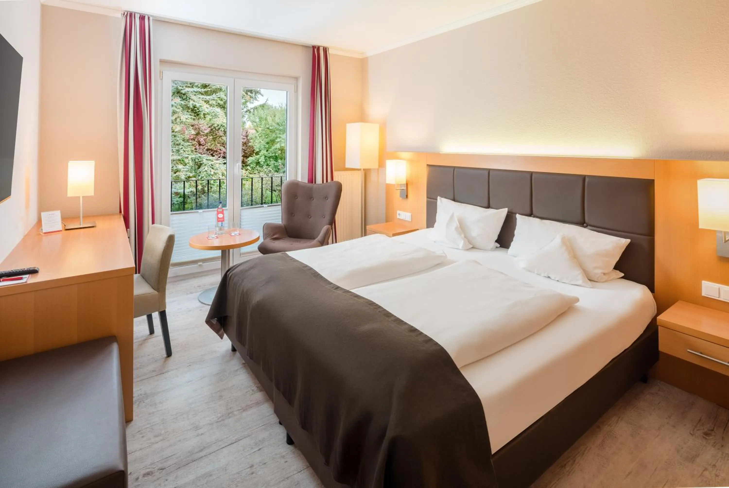 Photo of the whole room, Bed in Moin Hotel Cuxhaven