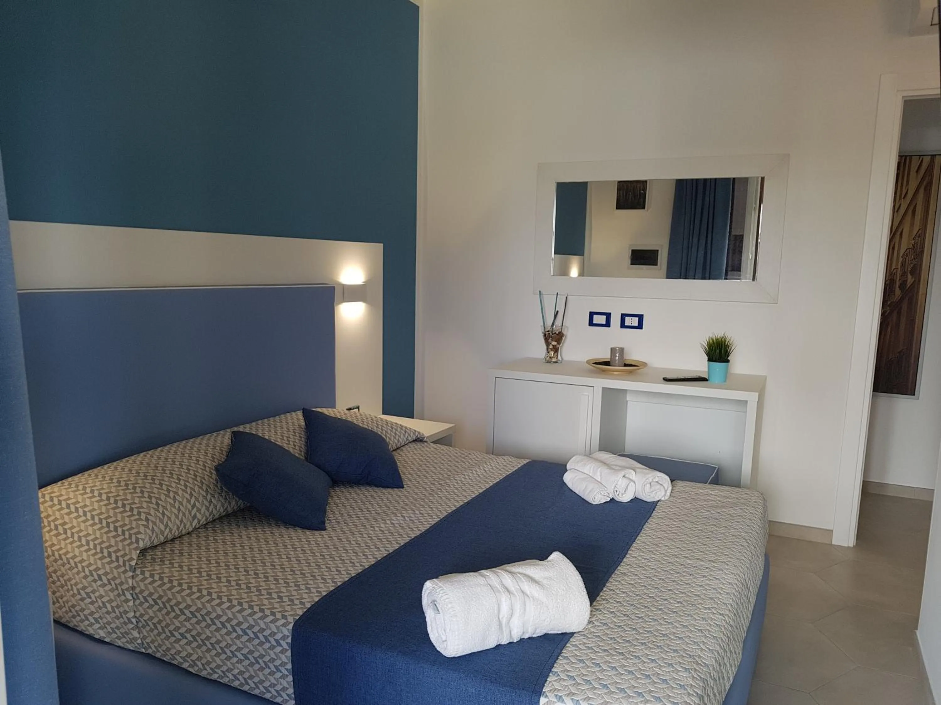 Bed in B&B Aloe Comfort Rooms