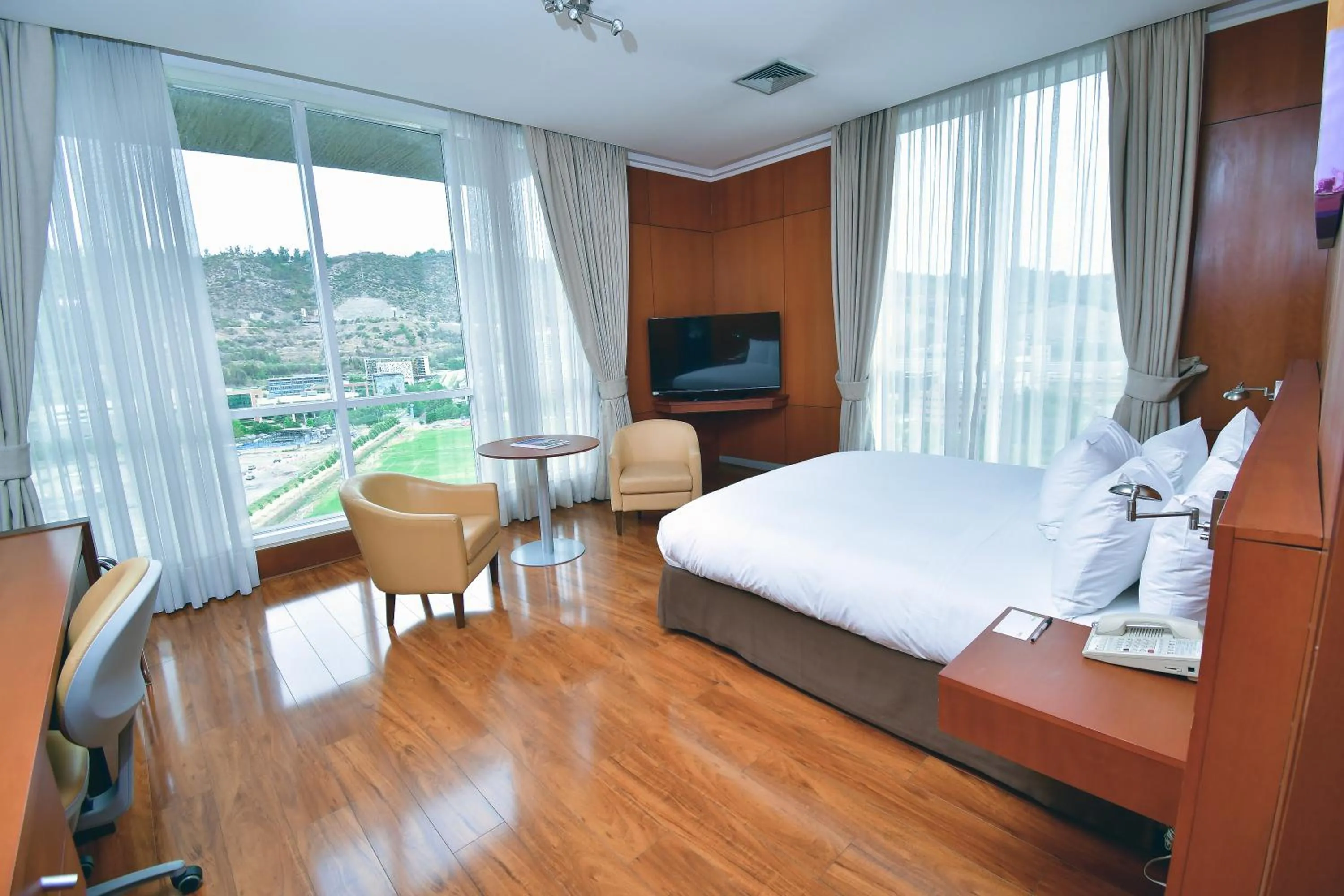 Bedroom in Radisson Ciudad Empresarial Santiago