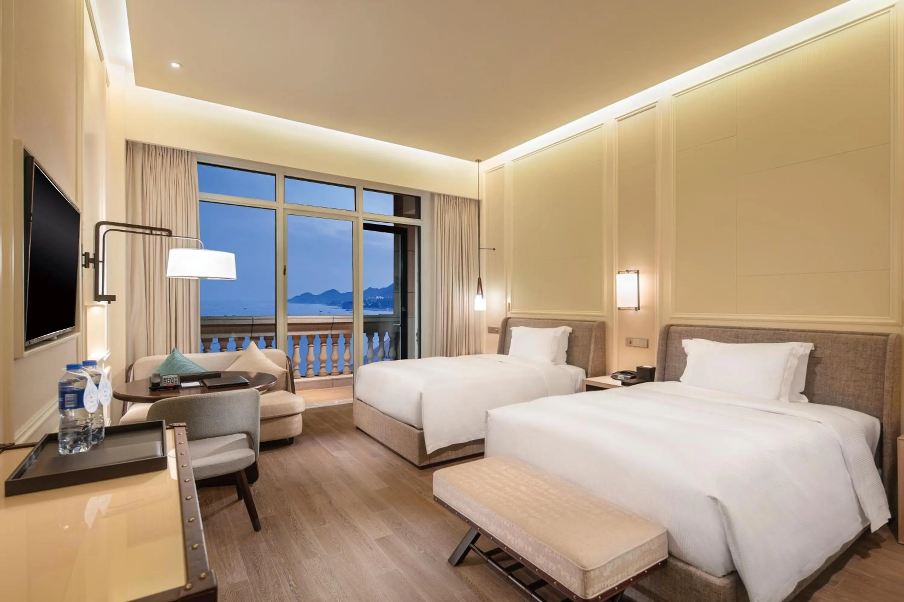 Photo of the whole room, Bed in Hilton Dalian Golden Pebble Beach Resort