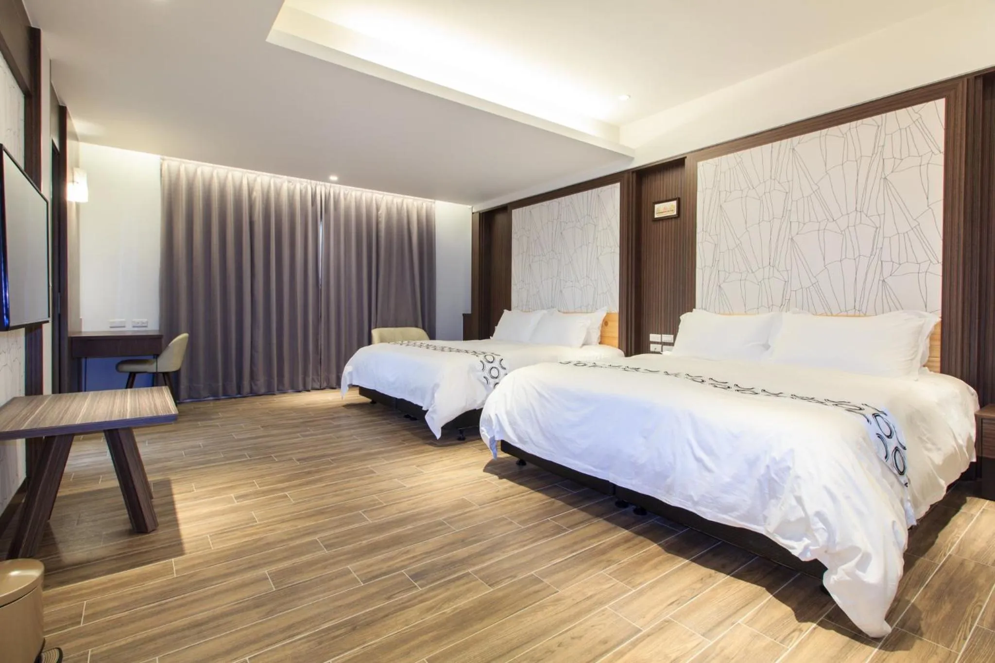 Bed in Urban Oasis Inn