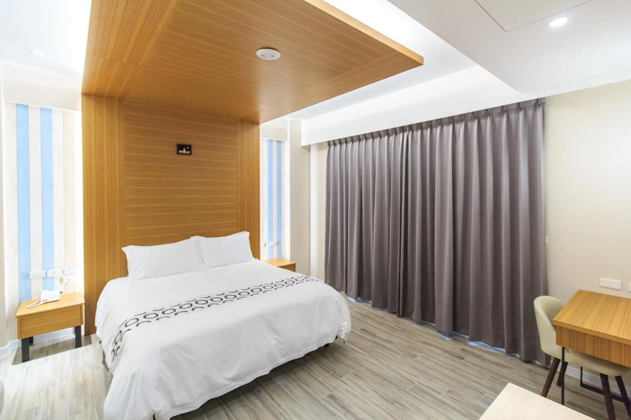 Bed in Urban Oasis Inn