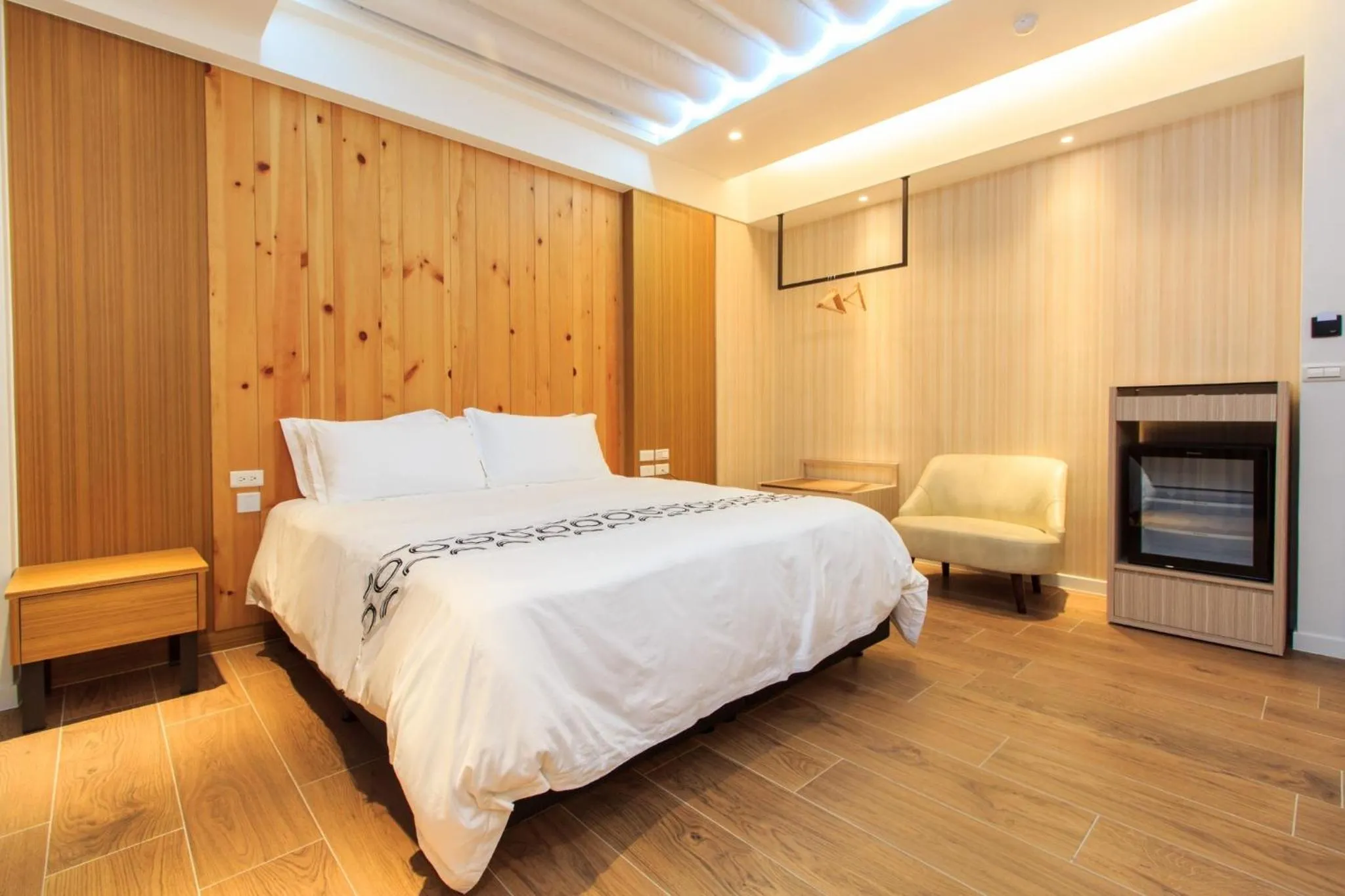 Bed in Urban Oasis Inn