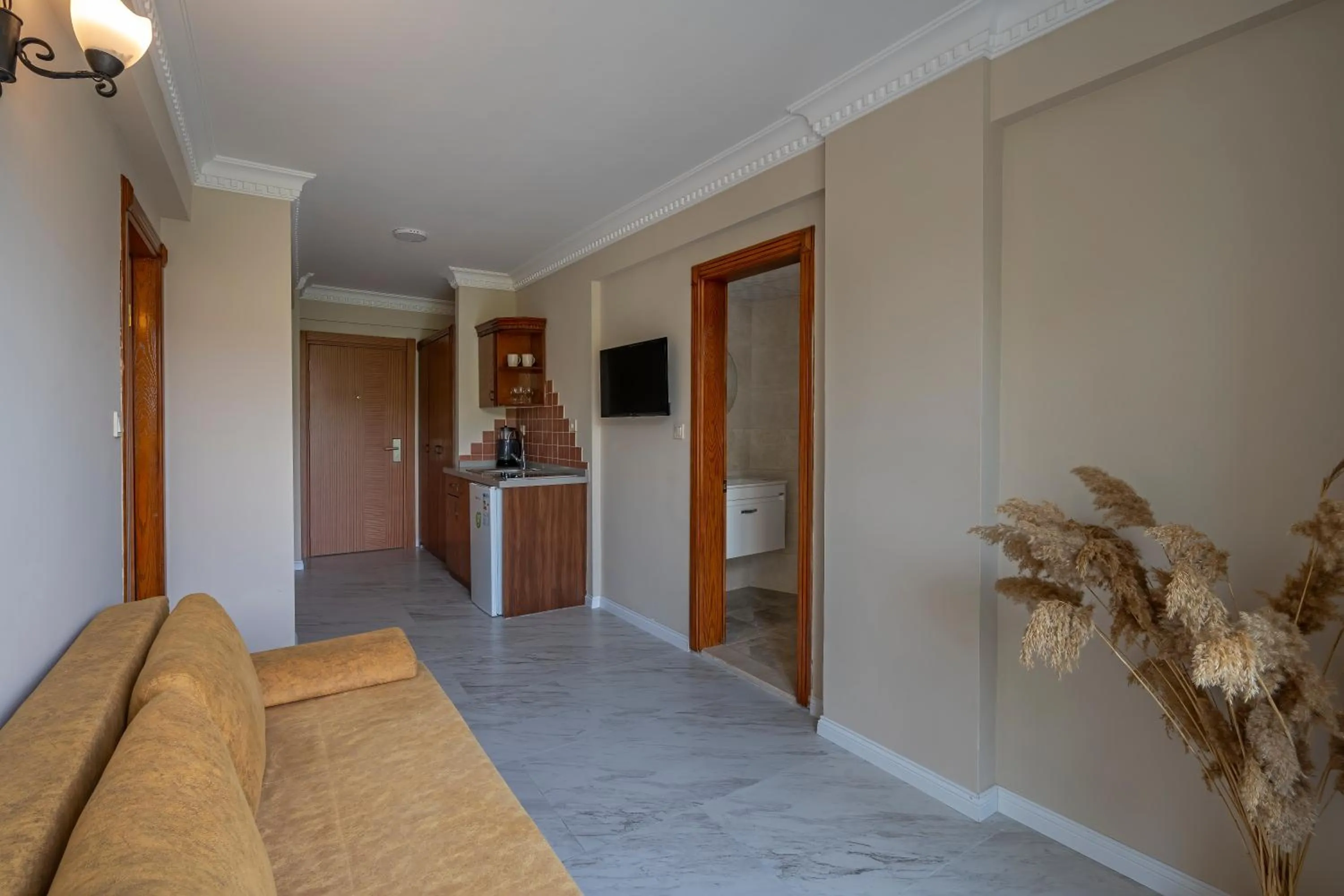 Kitchen or kitchenette in Rosy Suites Hotel