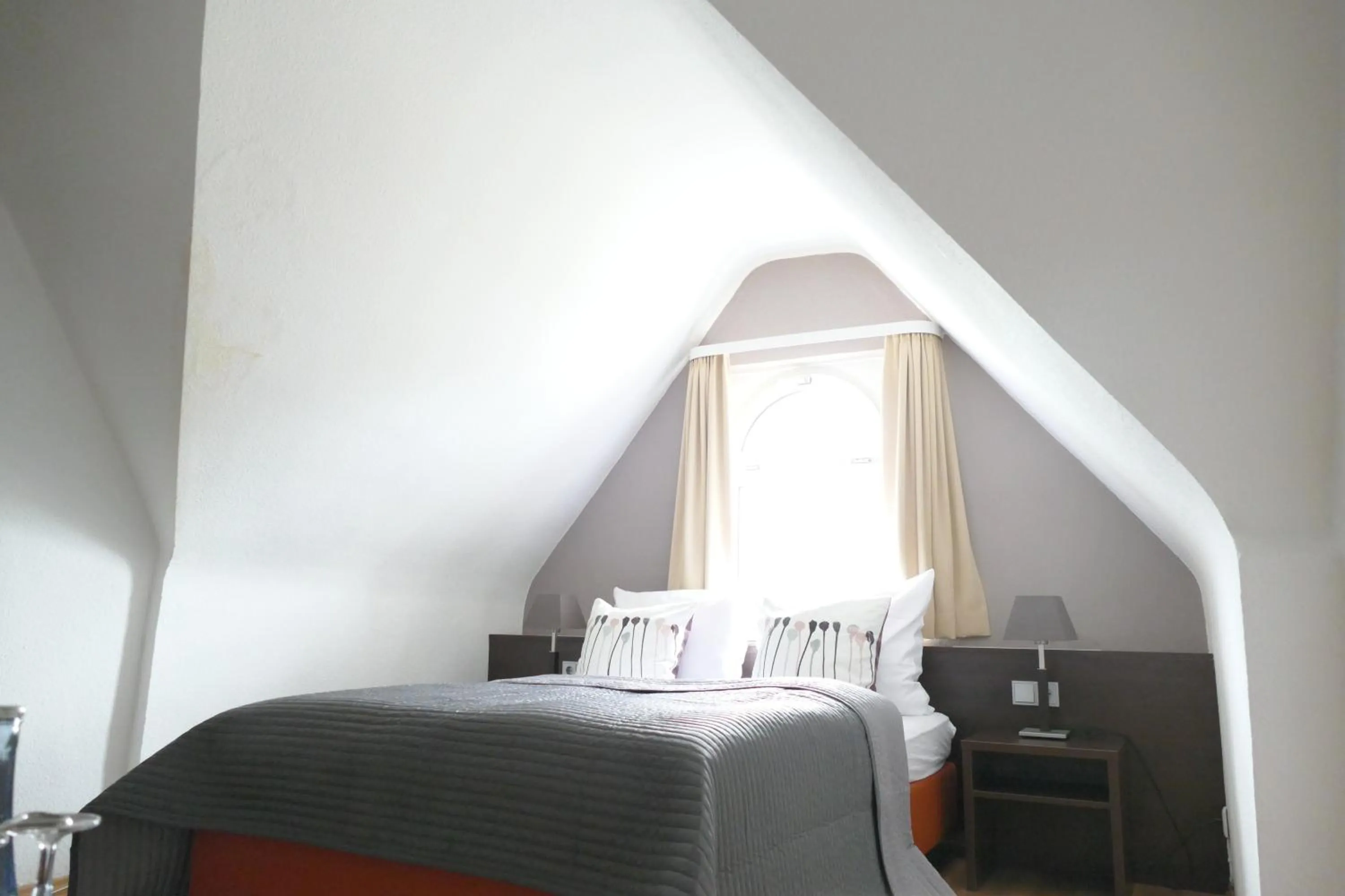 Photo of the whole room, Bed in DAS Steeps Ihr Brauhaus und Hotel