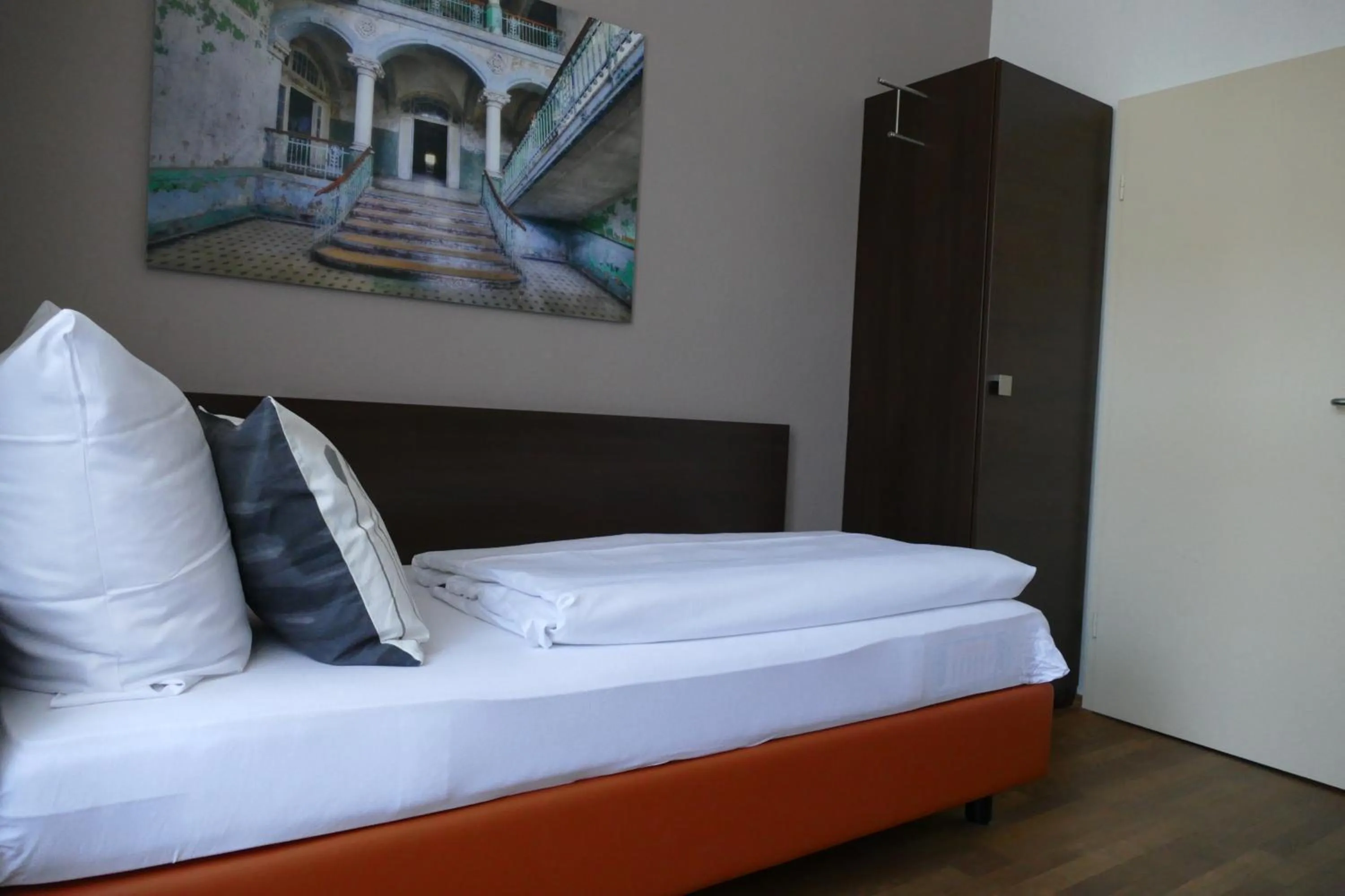 Photo of the whole room, Bed in DAS Steeps Ihr Brauhaus und Hotel