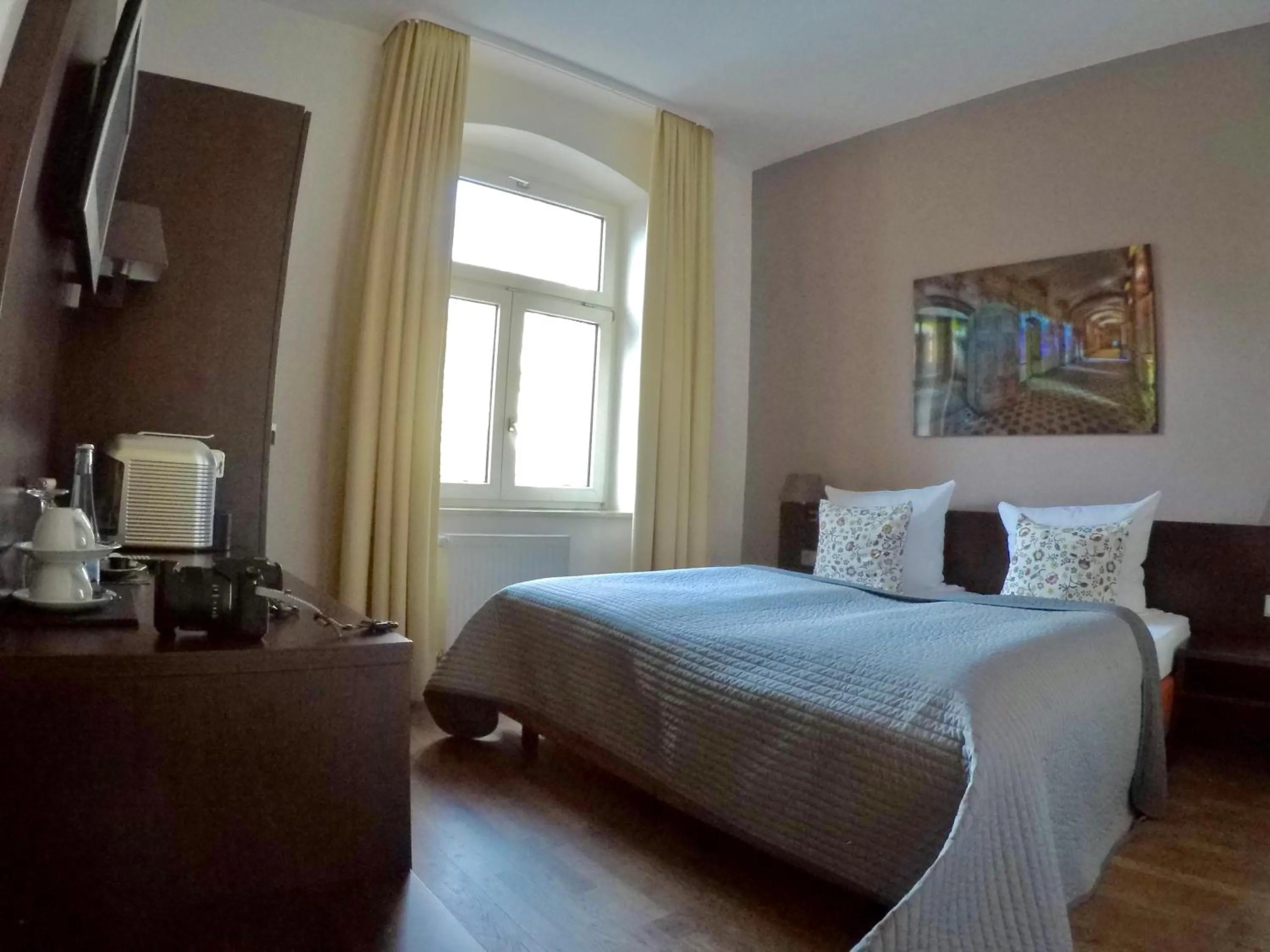 Photo of the whole room, Bed in DAS Steeps Ihr Brauhaus und Hotel