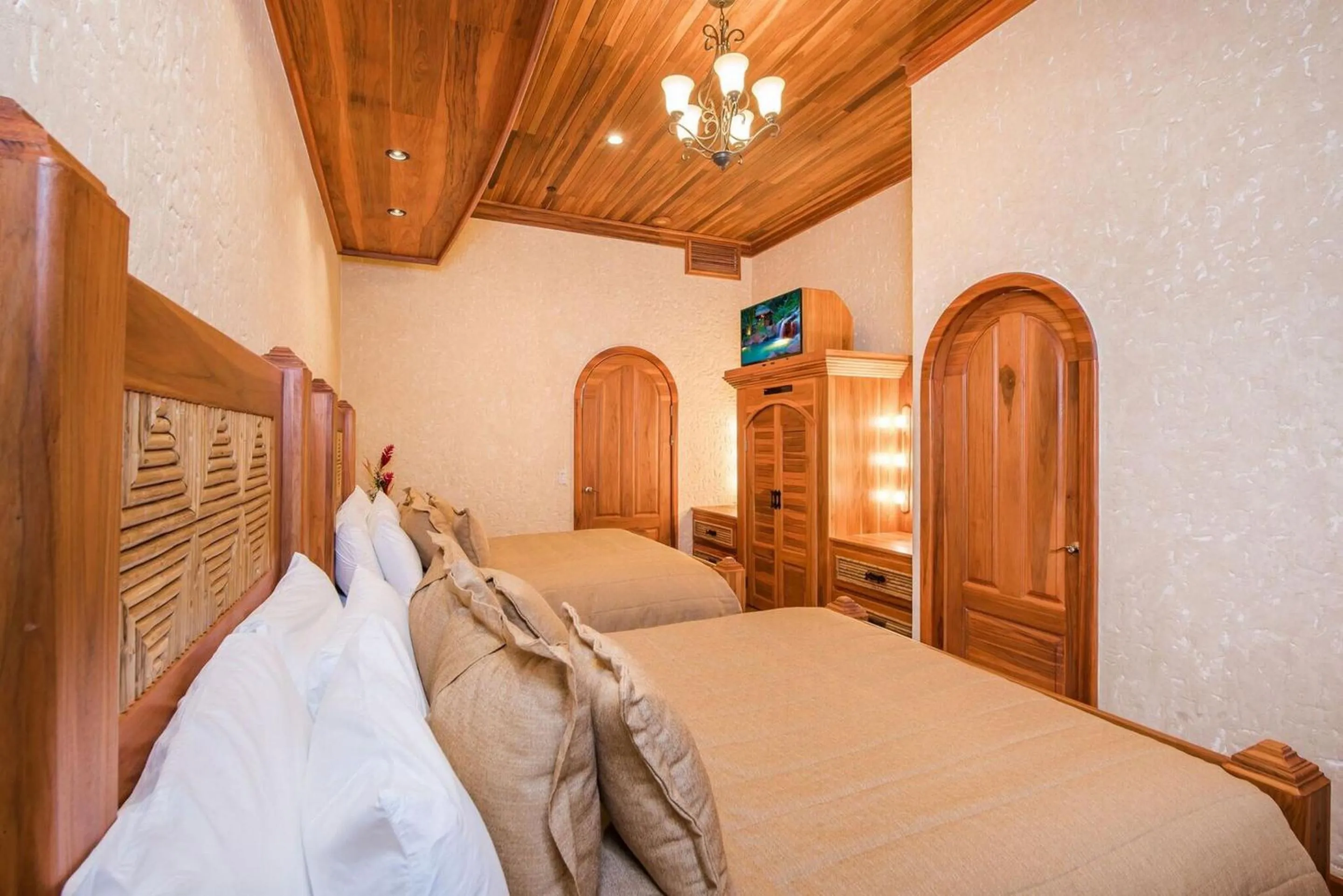 Bed in The Springs Resort & Spa at Arenal