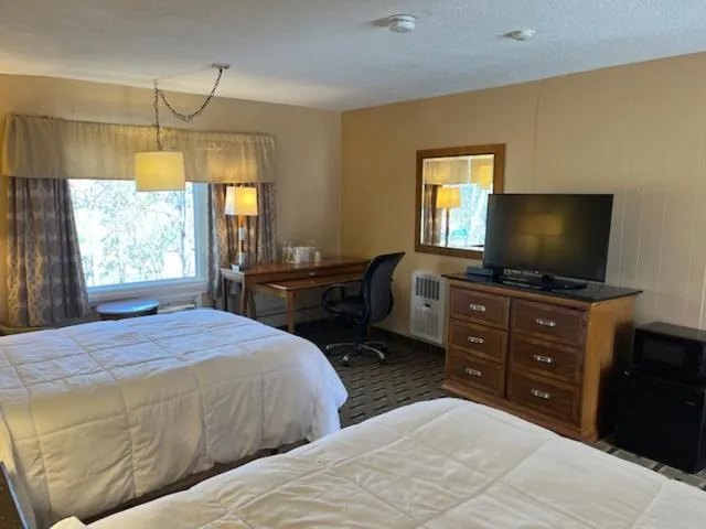 Bed in Arbor Inn Motor Lodge - Weymouth