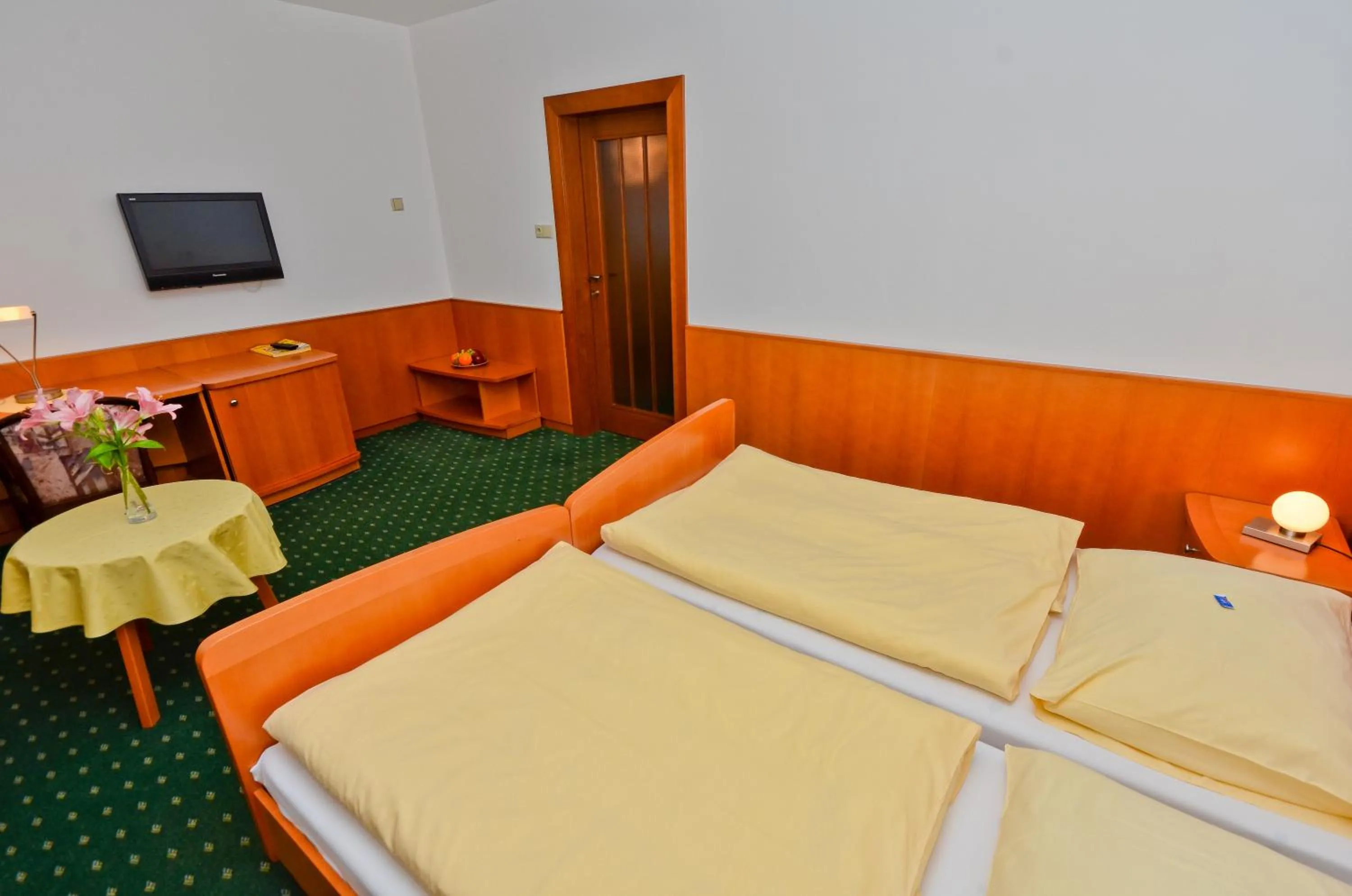 Dining area, Bed in Hotel Kotyza