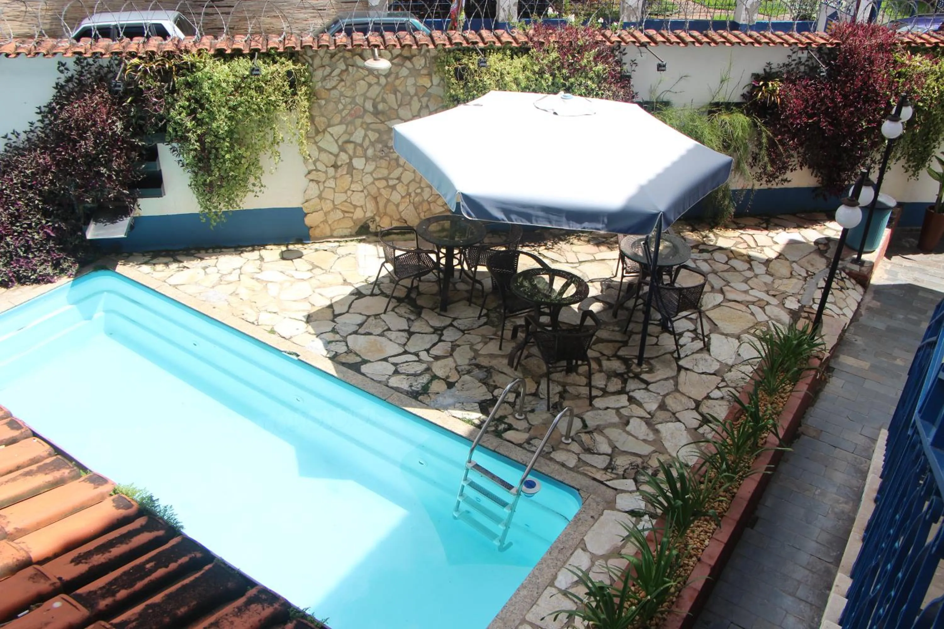Swimming pool in Pousada Villa Real