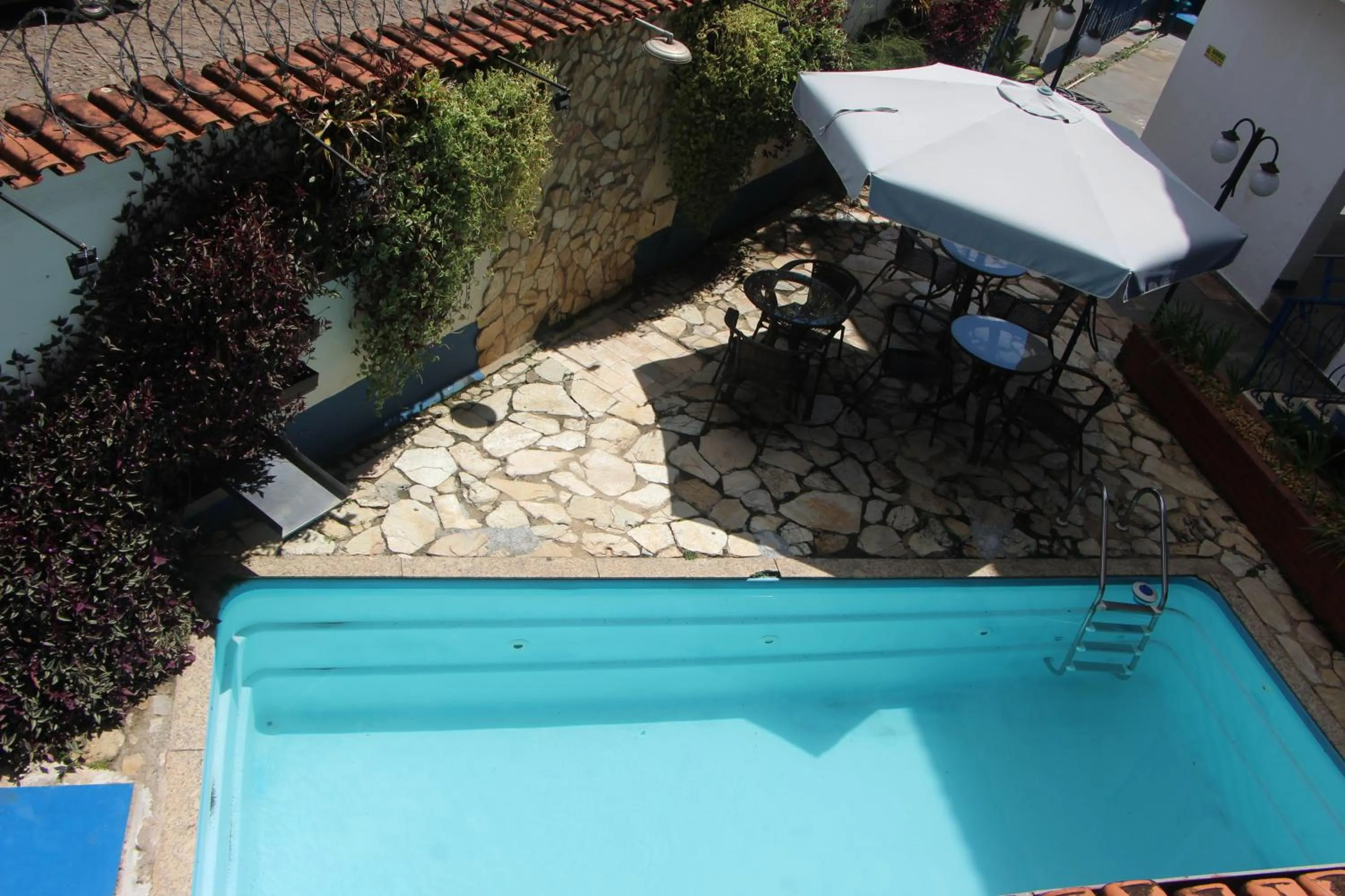 Swimming pool in Pousada Villa Real
