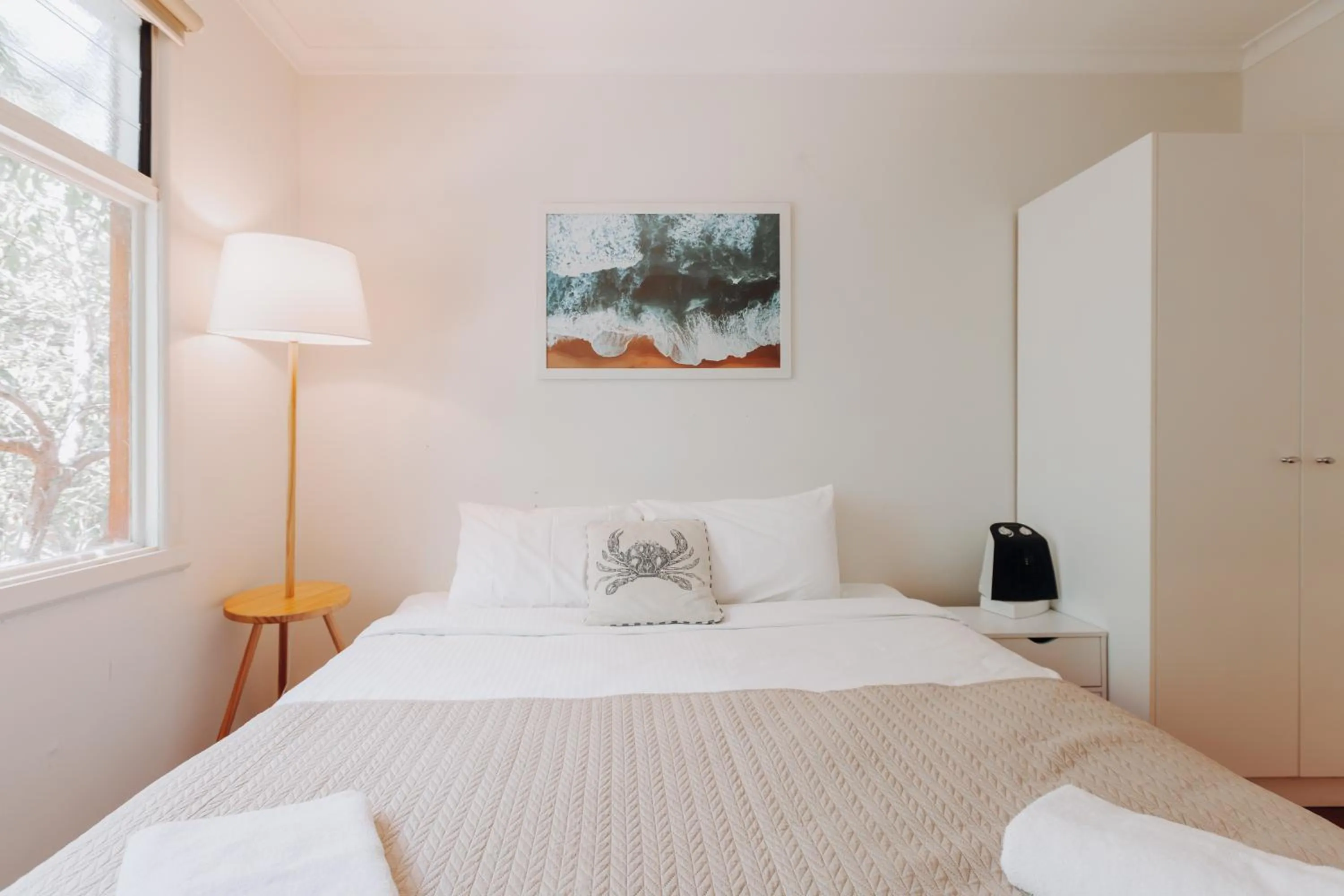 Bed in Beach Holiday Apartments