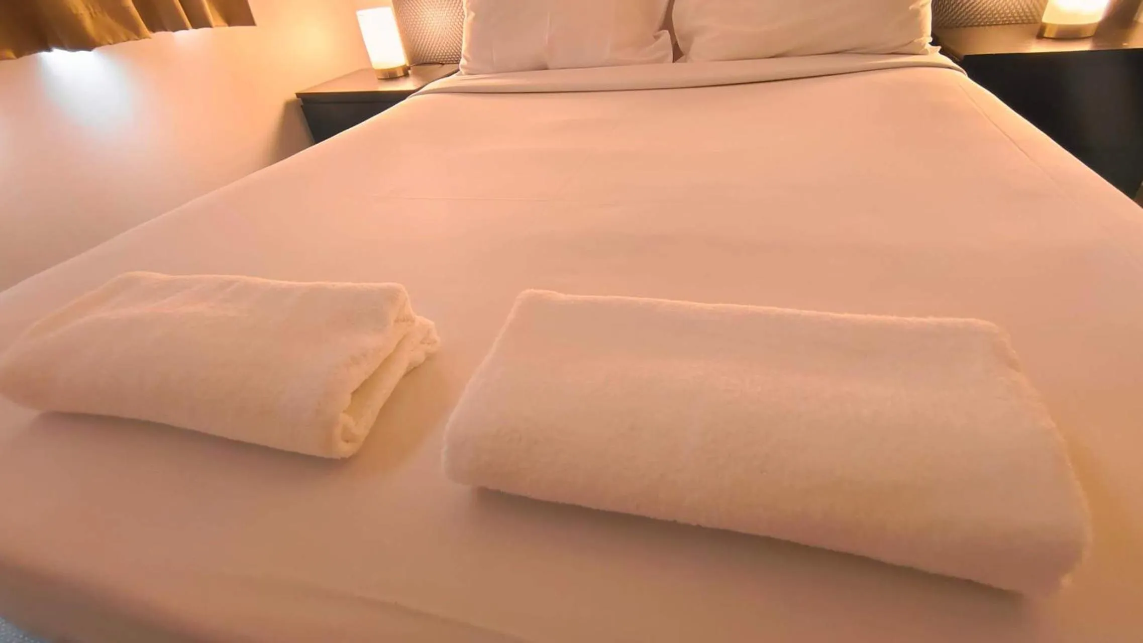 Bed in K Resort Surfers Paradise Apartments