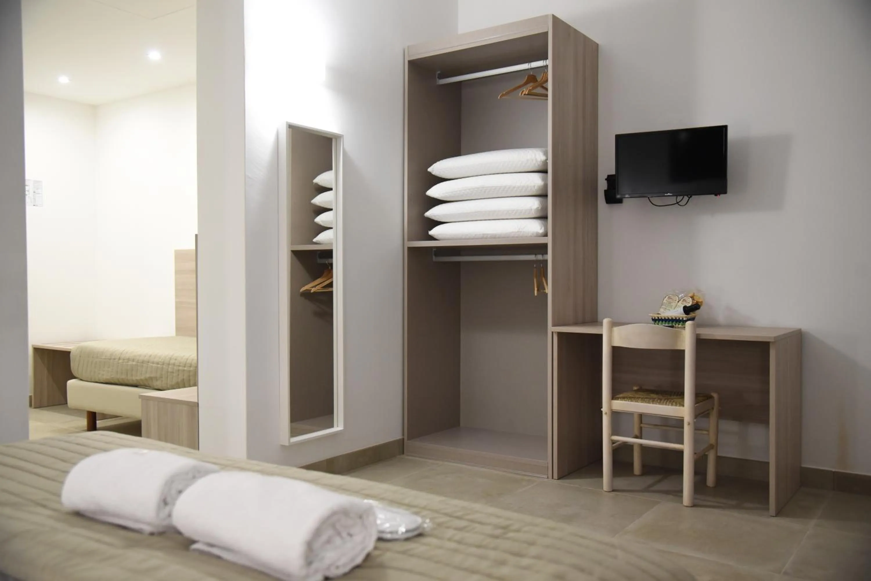 Bed in Hotel Belsito