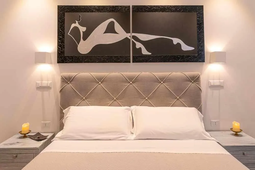 Bed in CeO LUXURY SUITE DI CAGLIARI