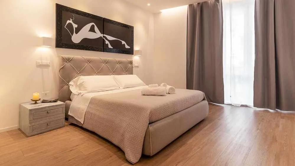 Bed in CeO LUXURY SUITE DI CAGLIARI