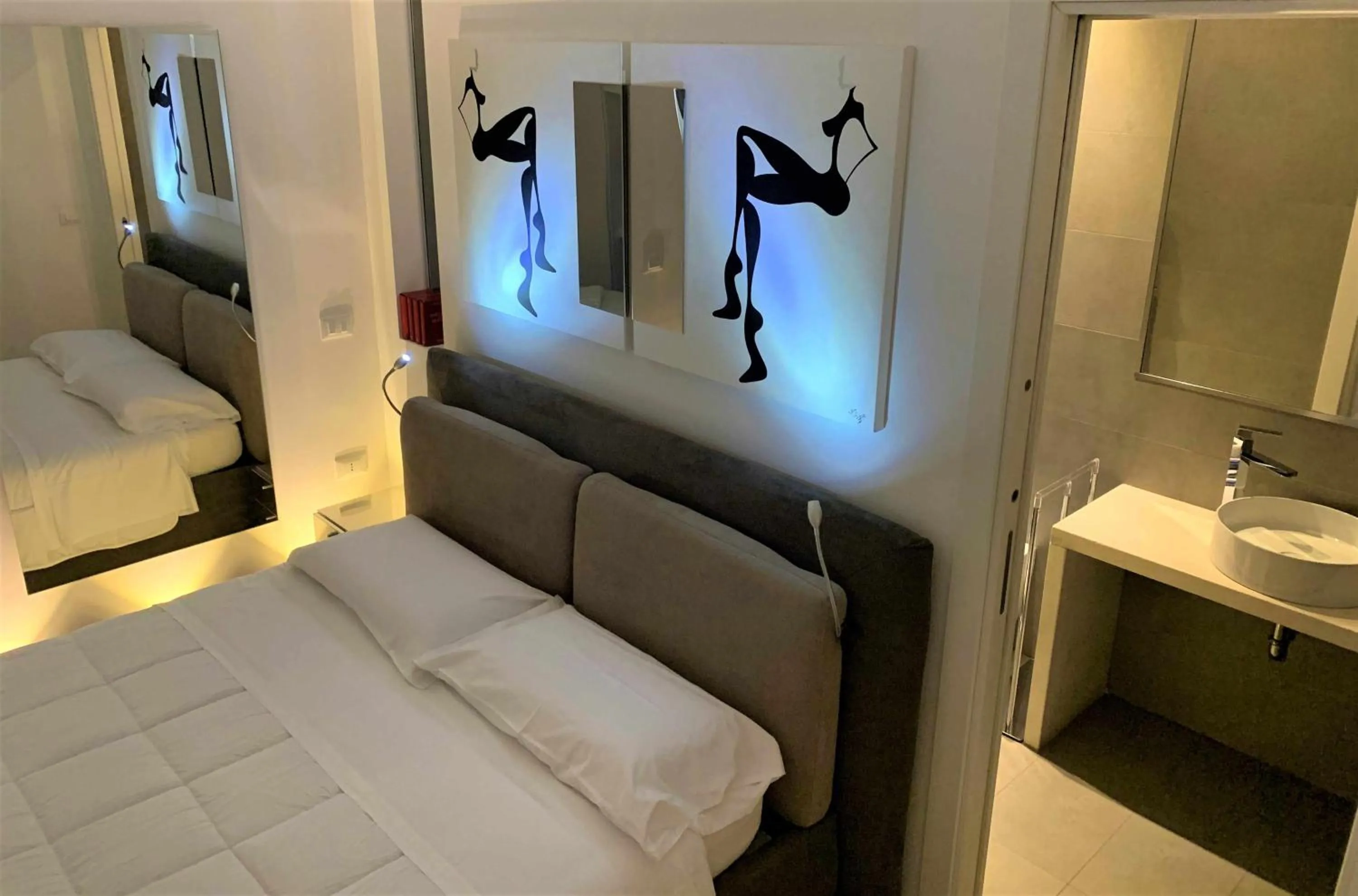 Bed in CeO LUXURY SUITE DI CAGLIARI