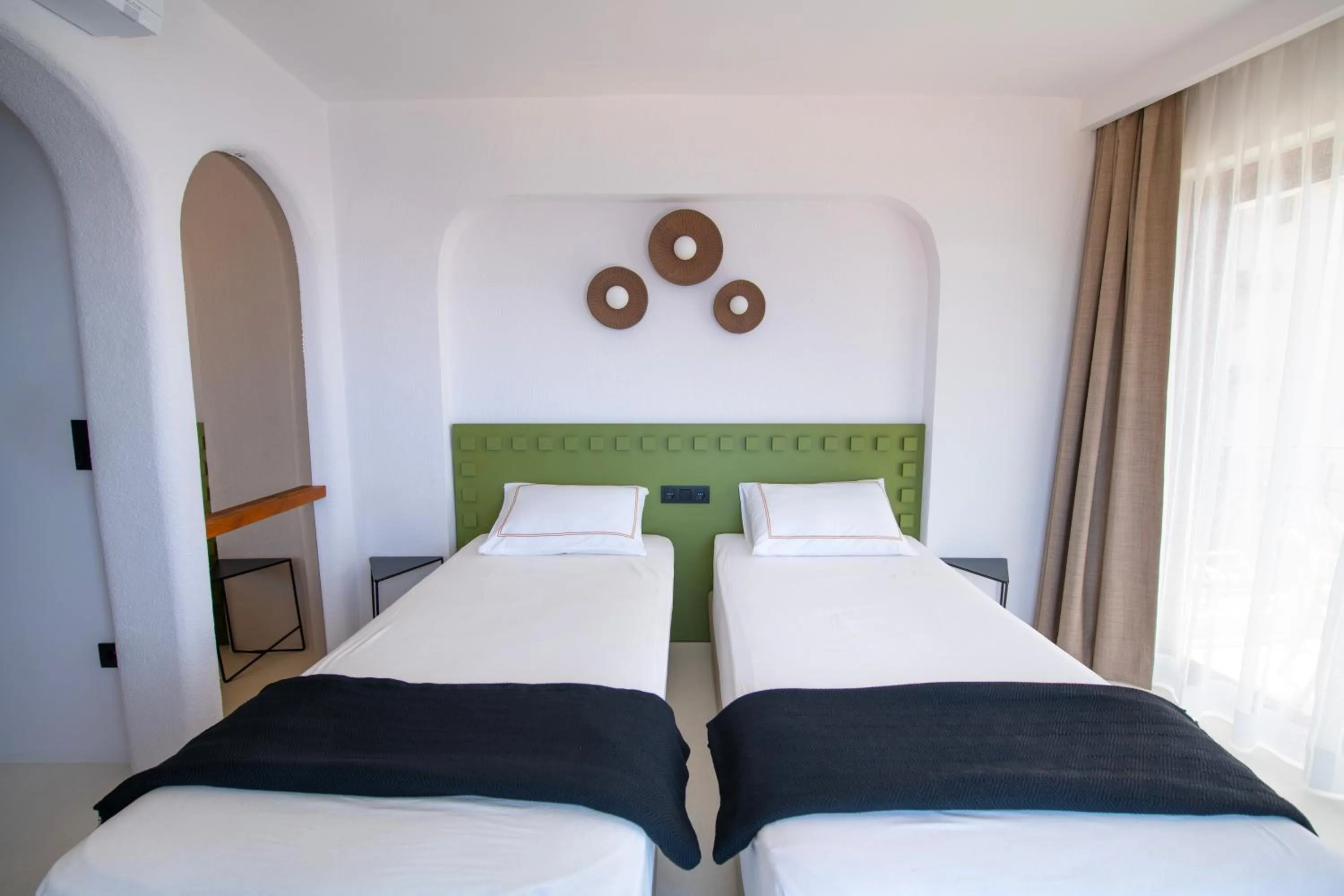 Bed in Hotel Begonvil