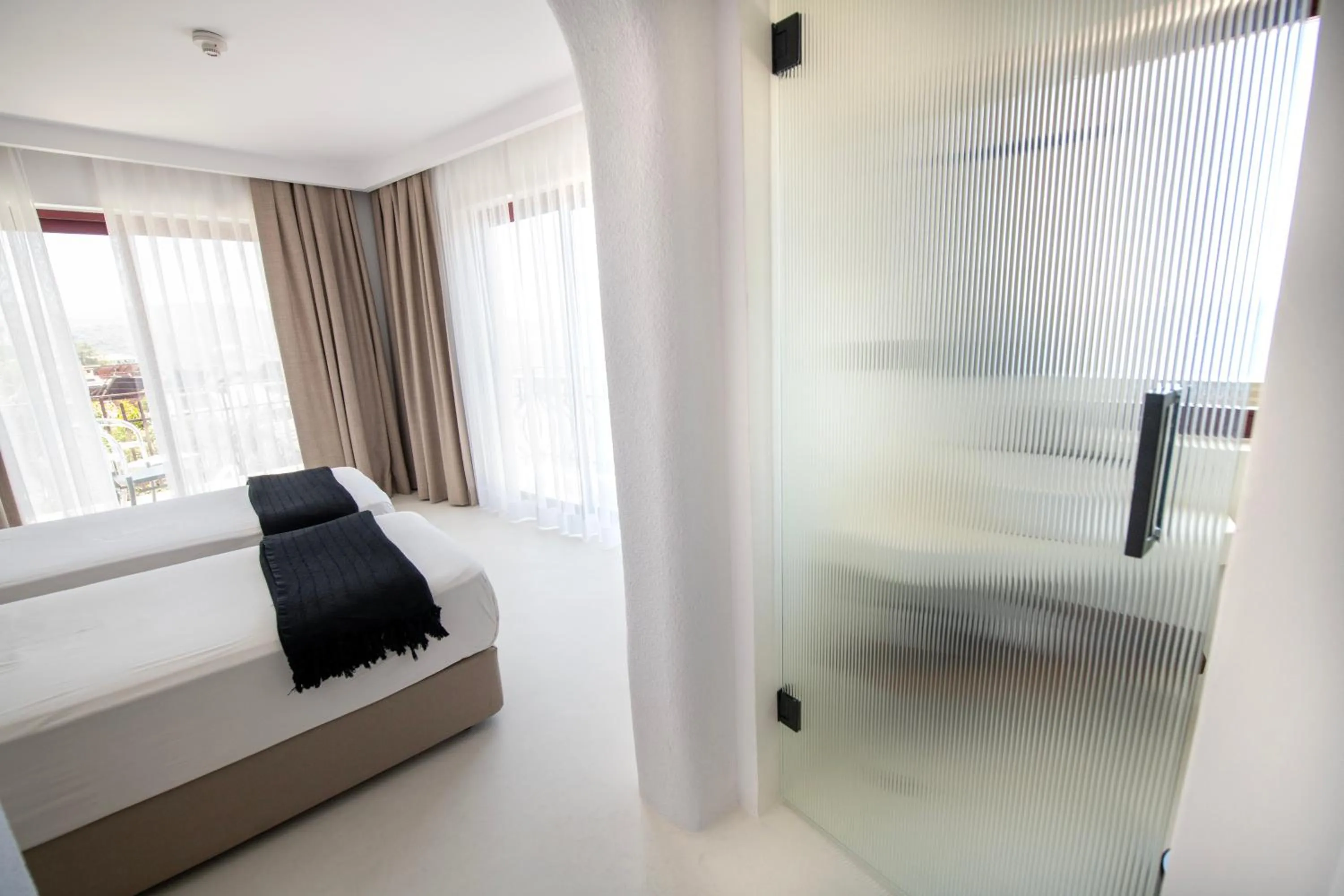 Bed in Hotel Begonvil