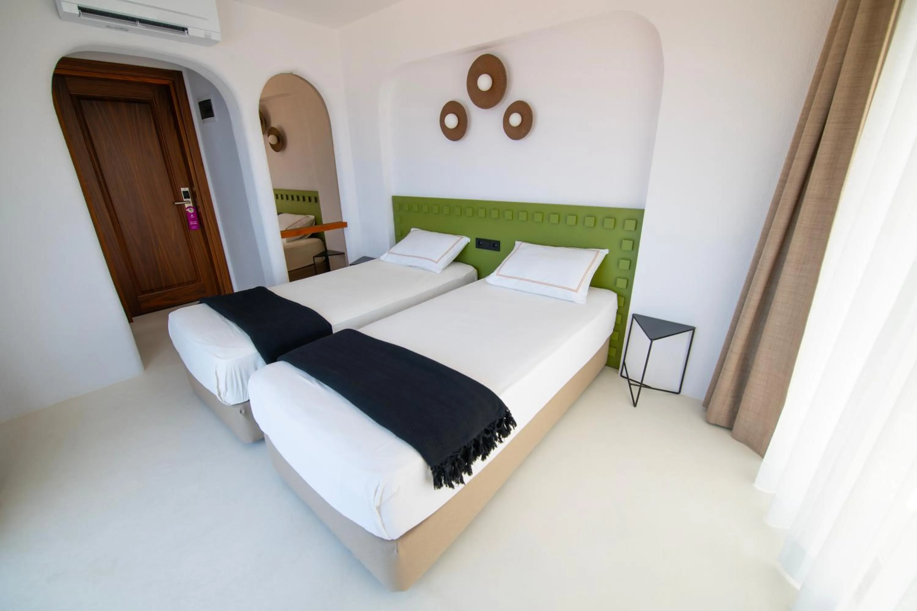 Bed in Hotel Begonvil