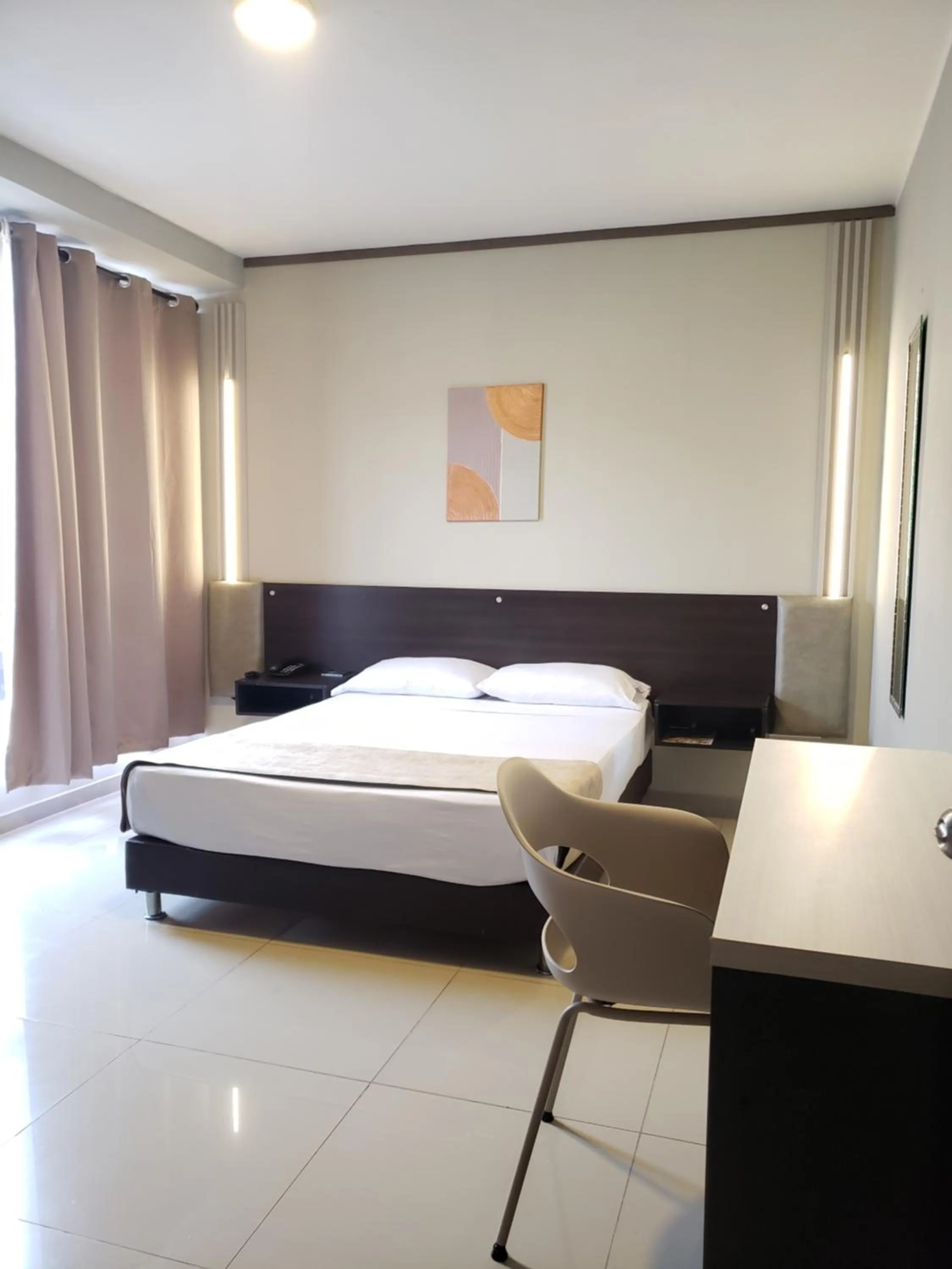 Bed in Hotel Suite Center Pereira