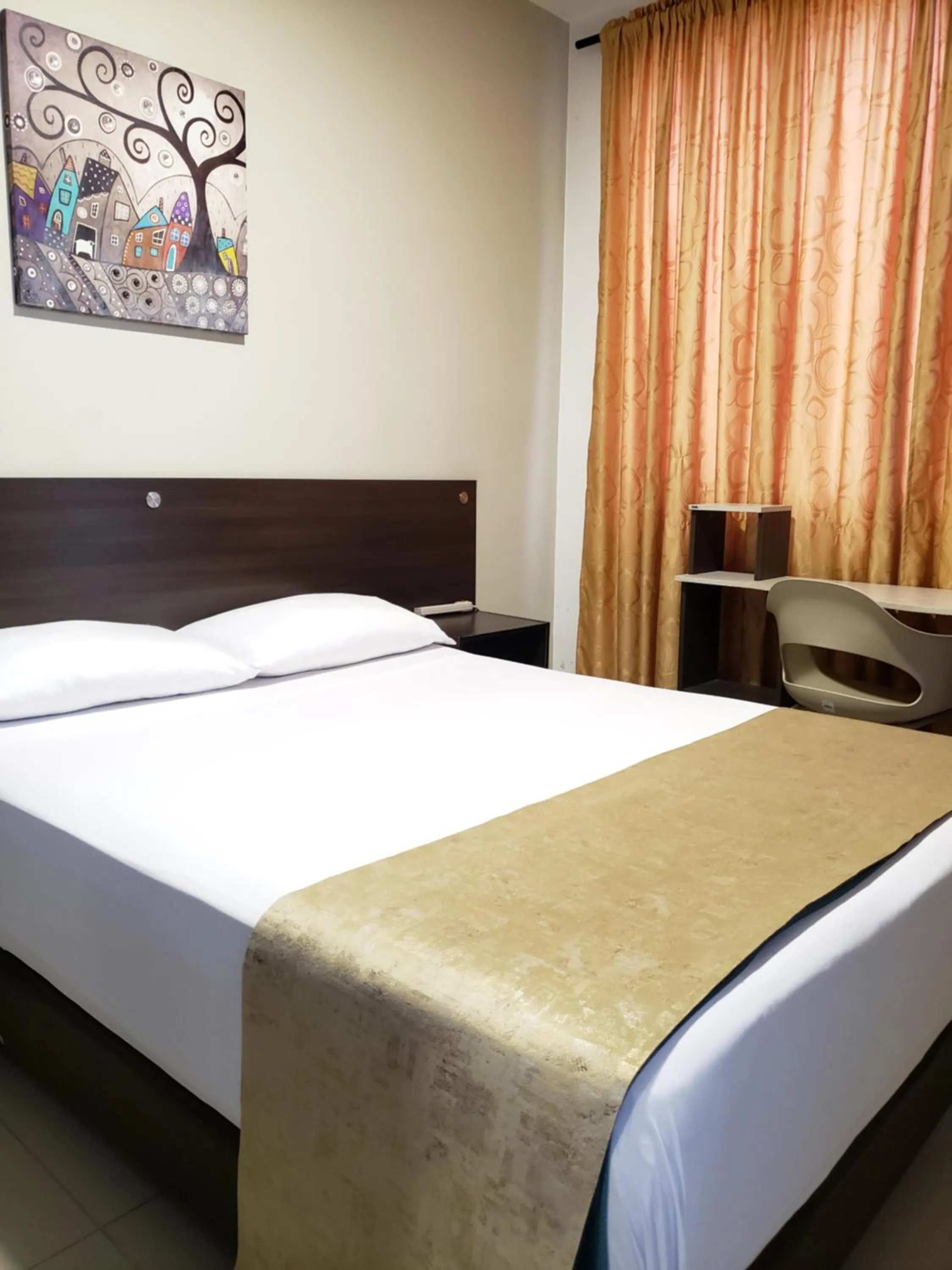 Bed in Hotel Suite Center Pereira