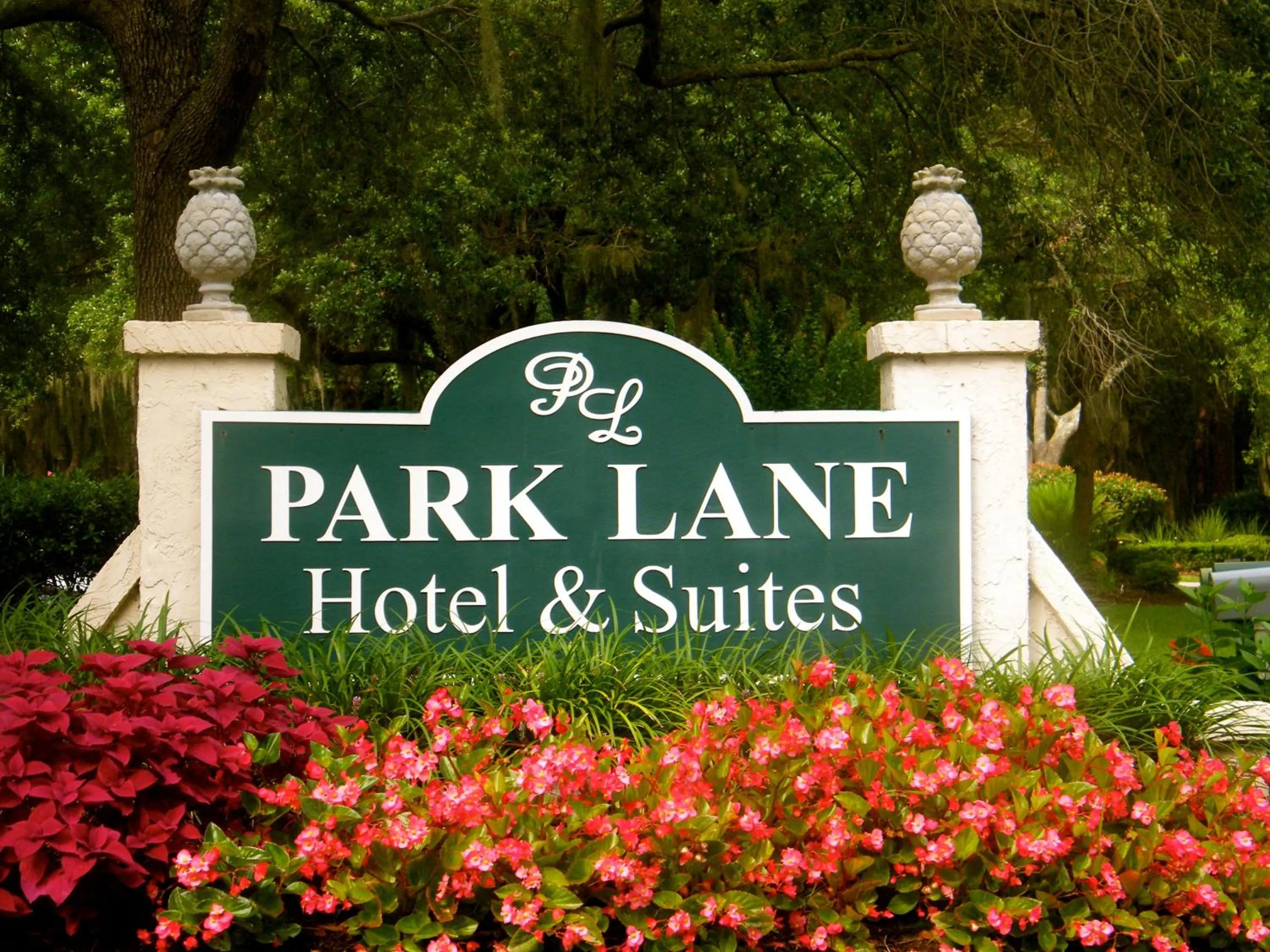 Property logo or sign in Palmera Inn and Suites