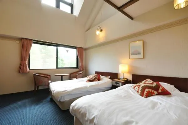 Bed in Hakuba Yamano Hotel