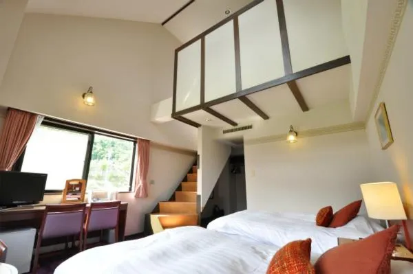 Bed in Hakuba Yamano Hotel