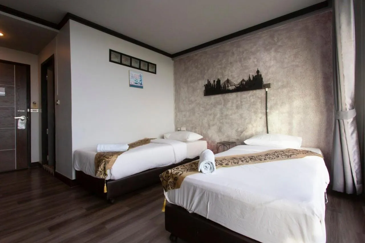 Bed in Pimpimarn Hotel