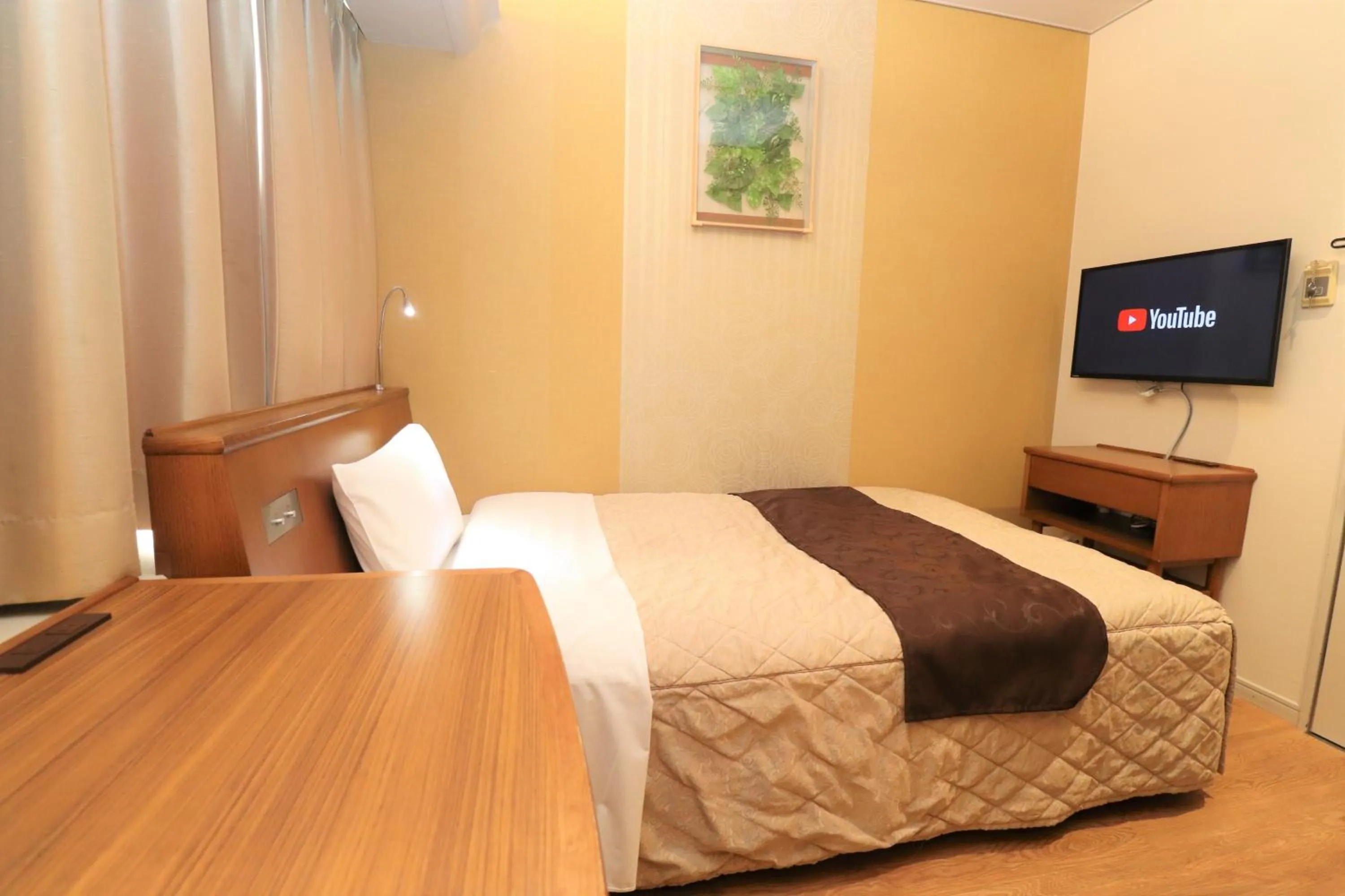 Bed in Tottori Onsen Hotel Monarque Tottori