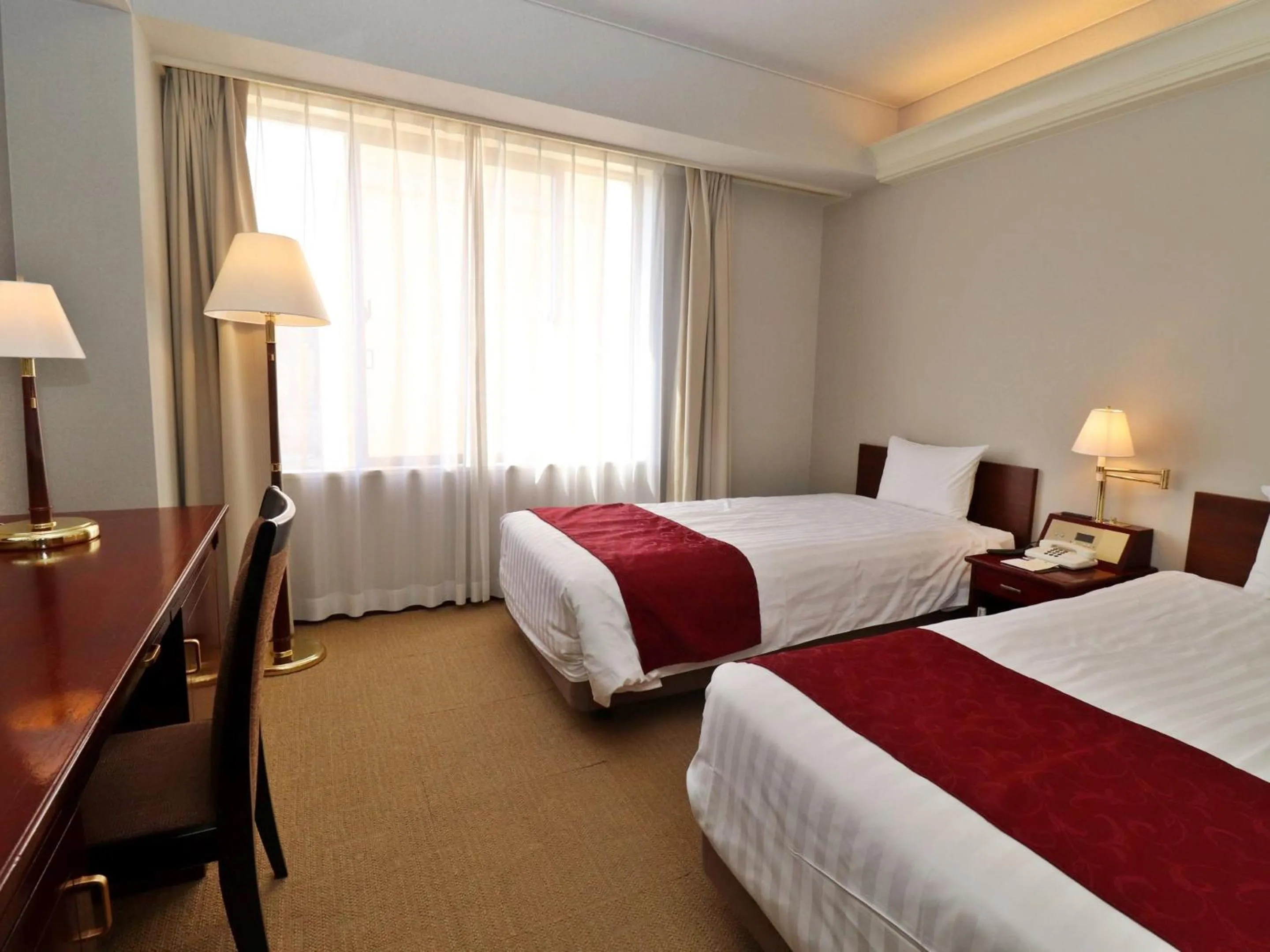 Bed in Tottori Onsen Hotel Monarque Tottori